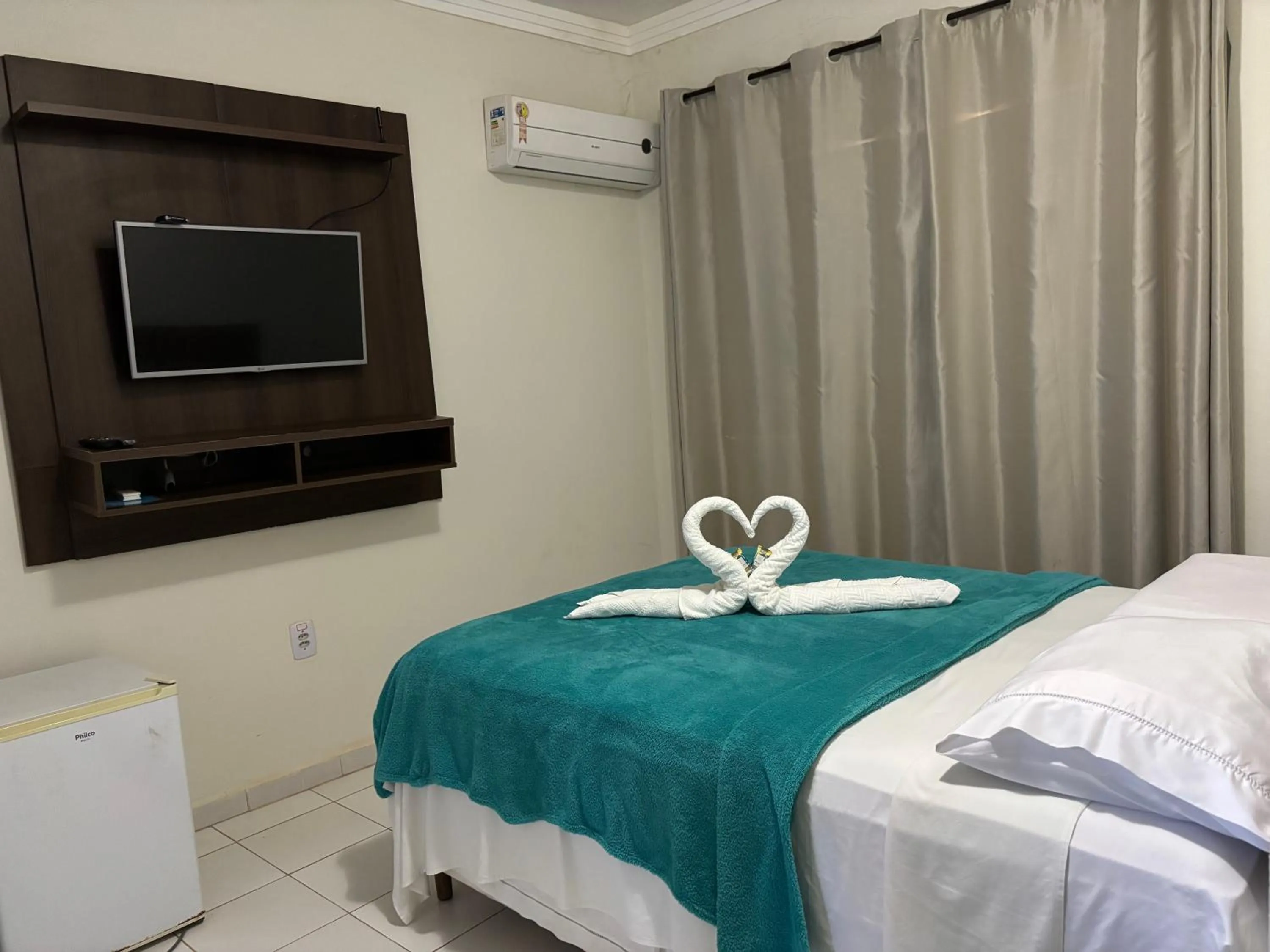 Bed in Pousada Vôo da Águia