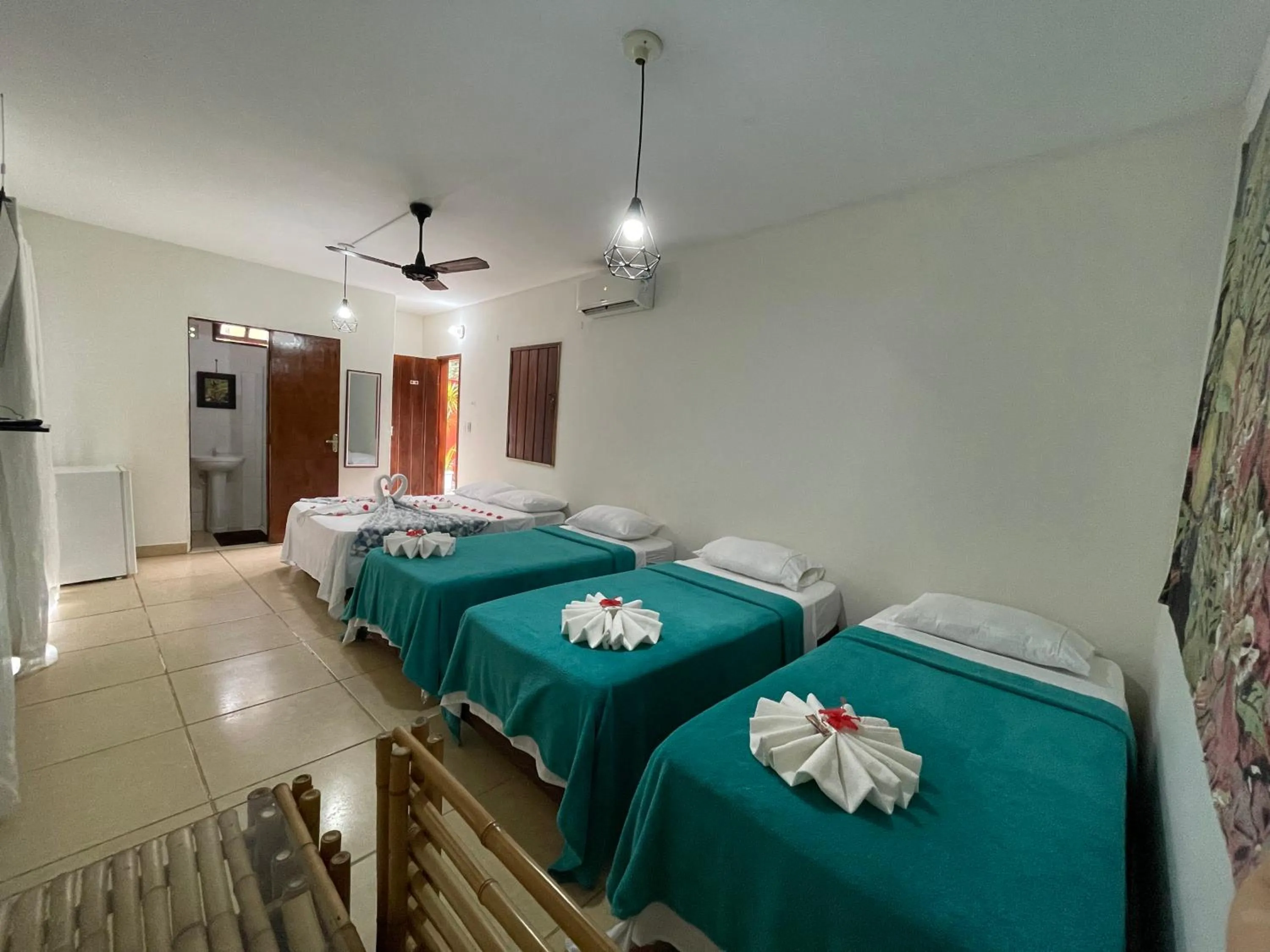 Bed in Pousada Vôo da Águia