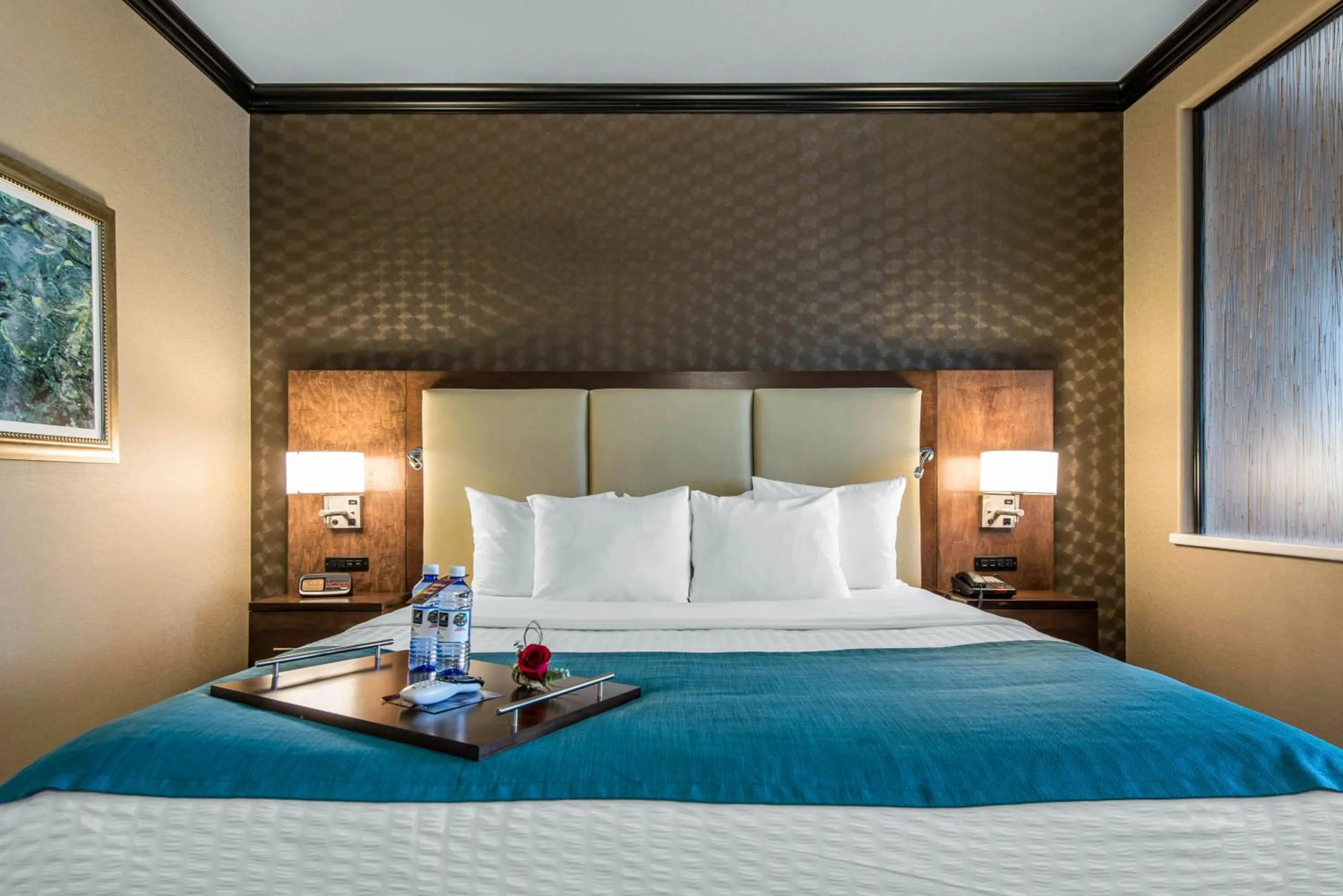 Bedroom, Room Photo in The Heritage Inn & Suites, Ascend Hotel Collection