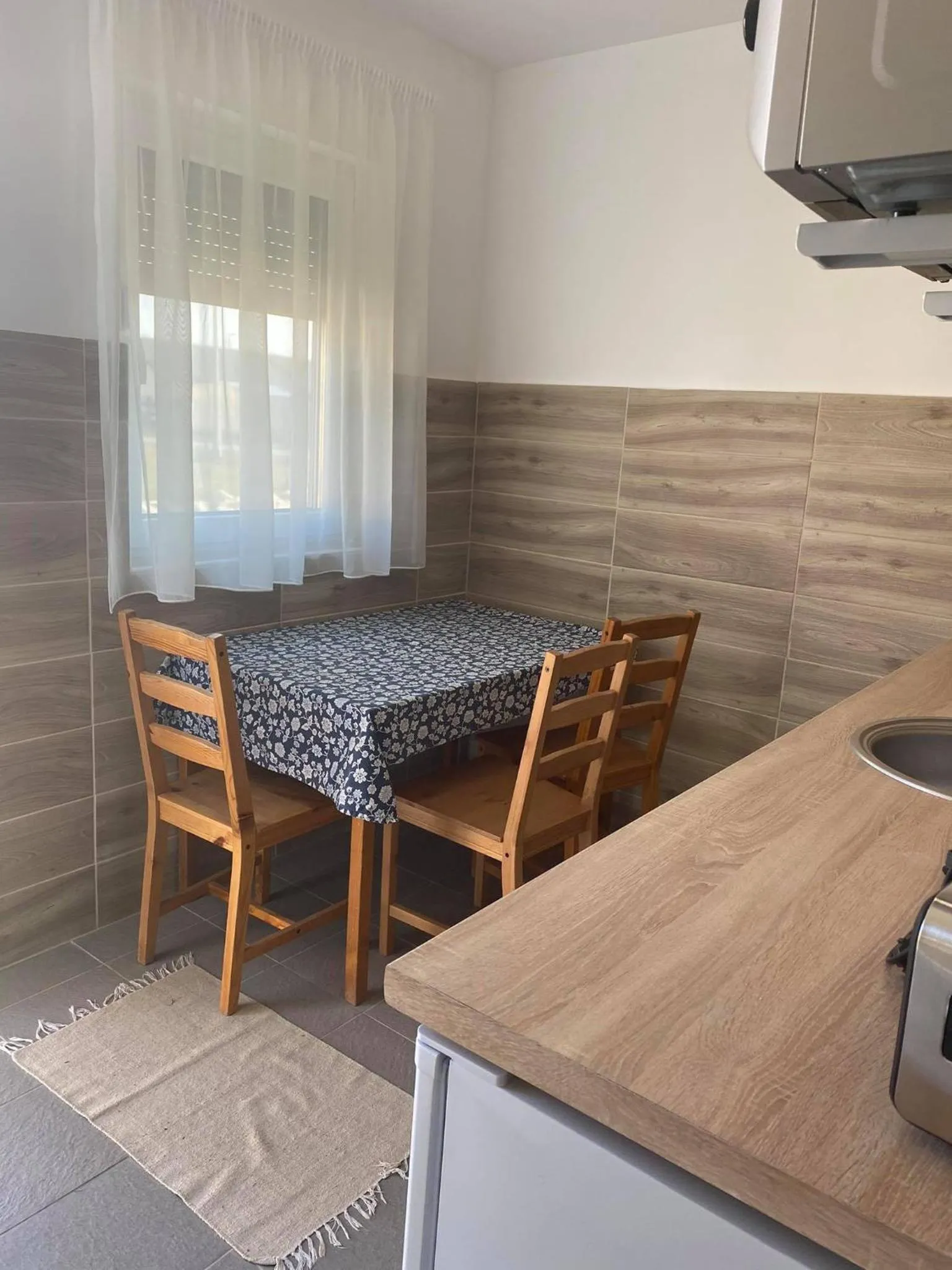 Kitchen or kitchenette in La Curia Panzió