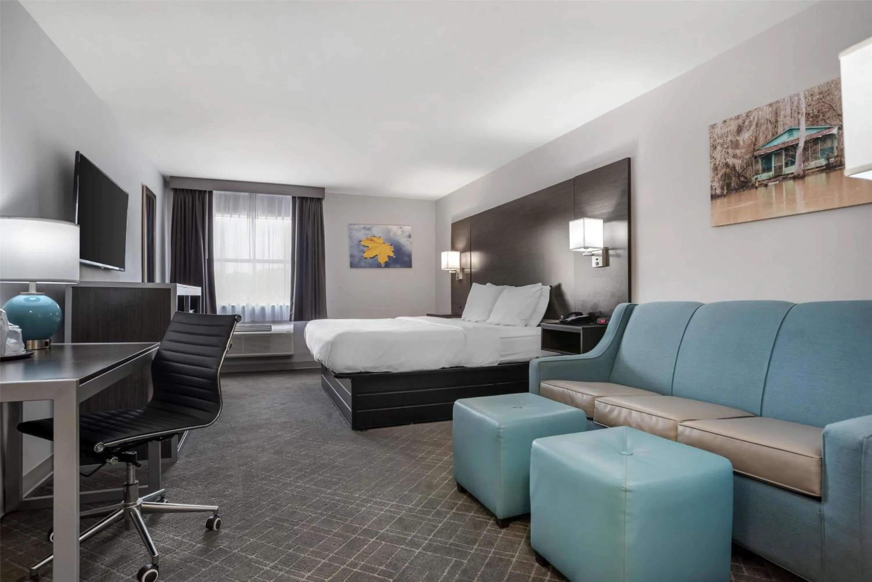 Bedroom, Bed in SureStay Plus by Best Western St. James Donaldsonville