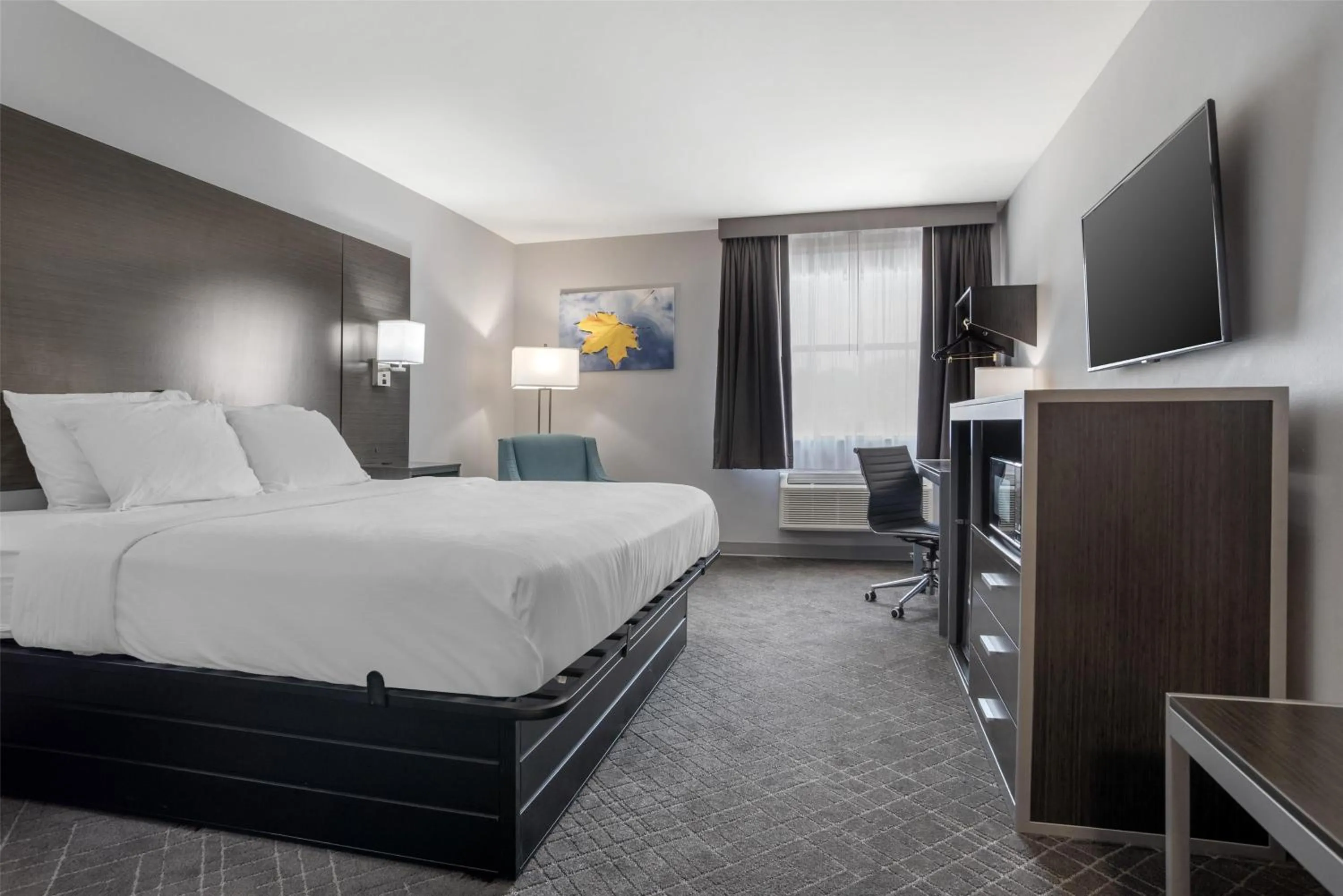 Bedroom, Bed in SureStay Plus by Best Western St. James Donaldsonville