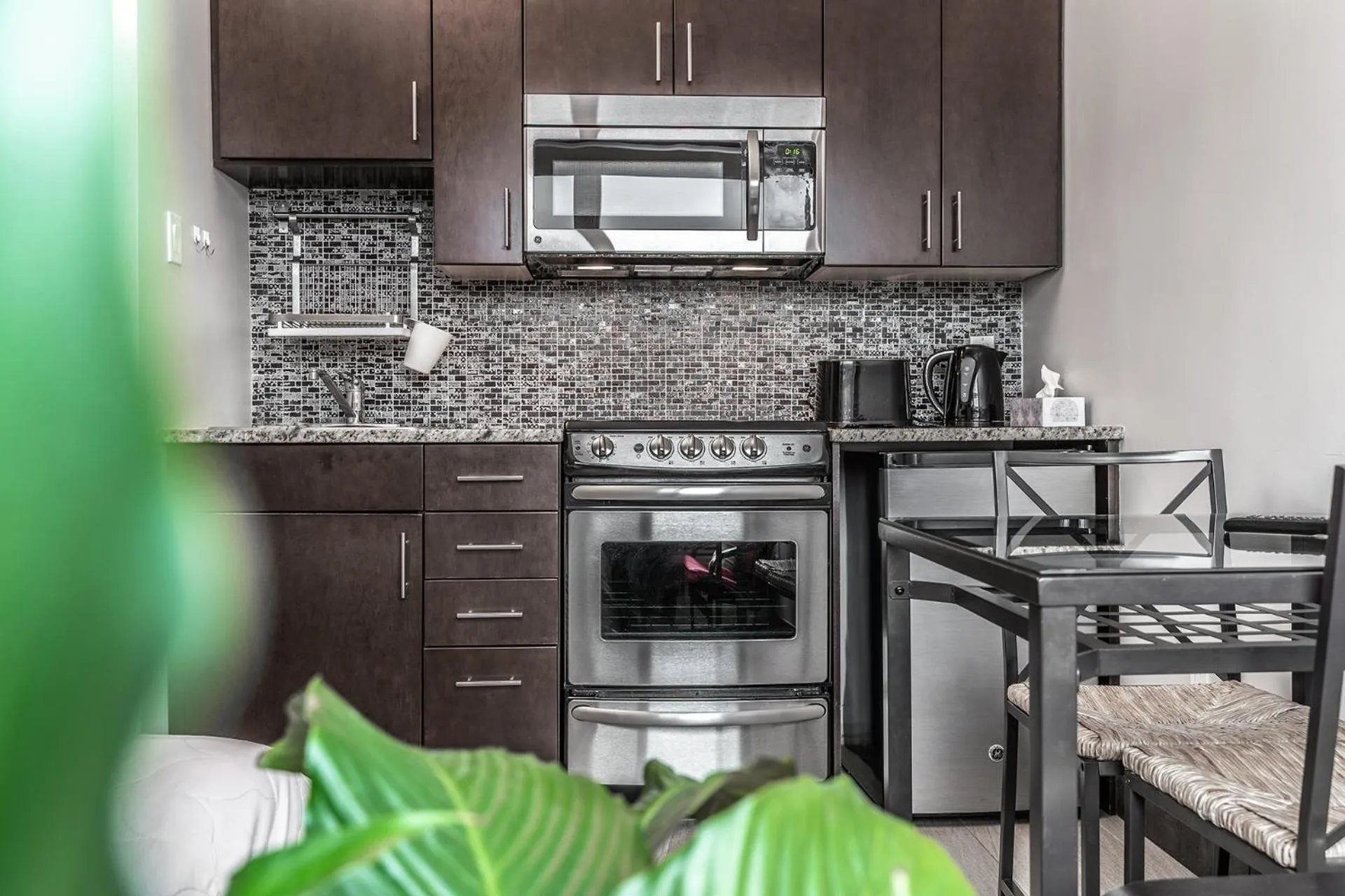 Kitchen or kitchenette in Cjour Apartments