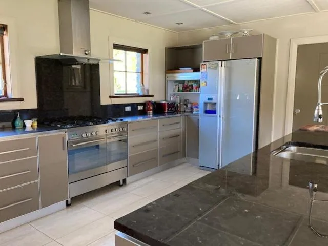 Kitchen or kitchenette in Three Thirty B & B