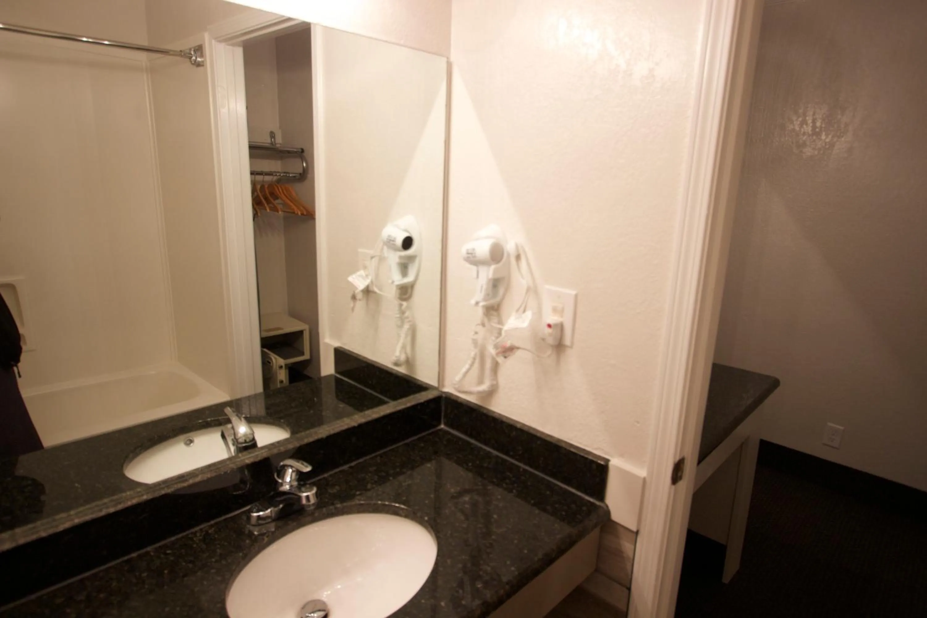 Toilet in At Home Inn - Pensacola