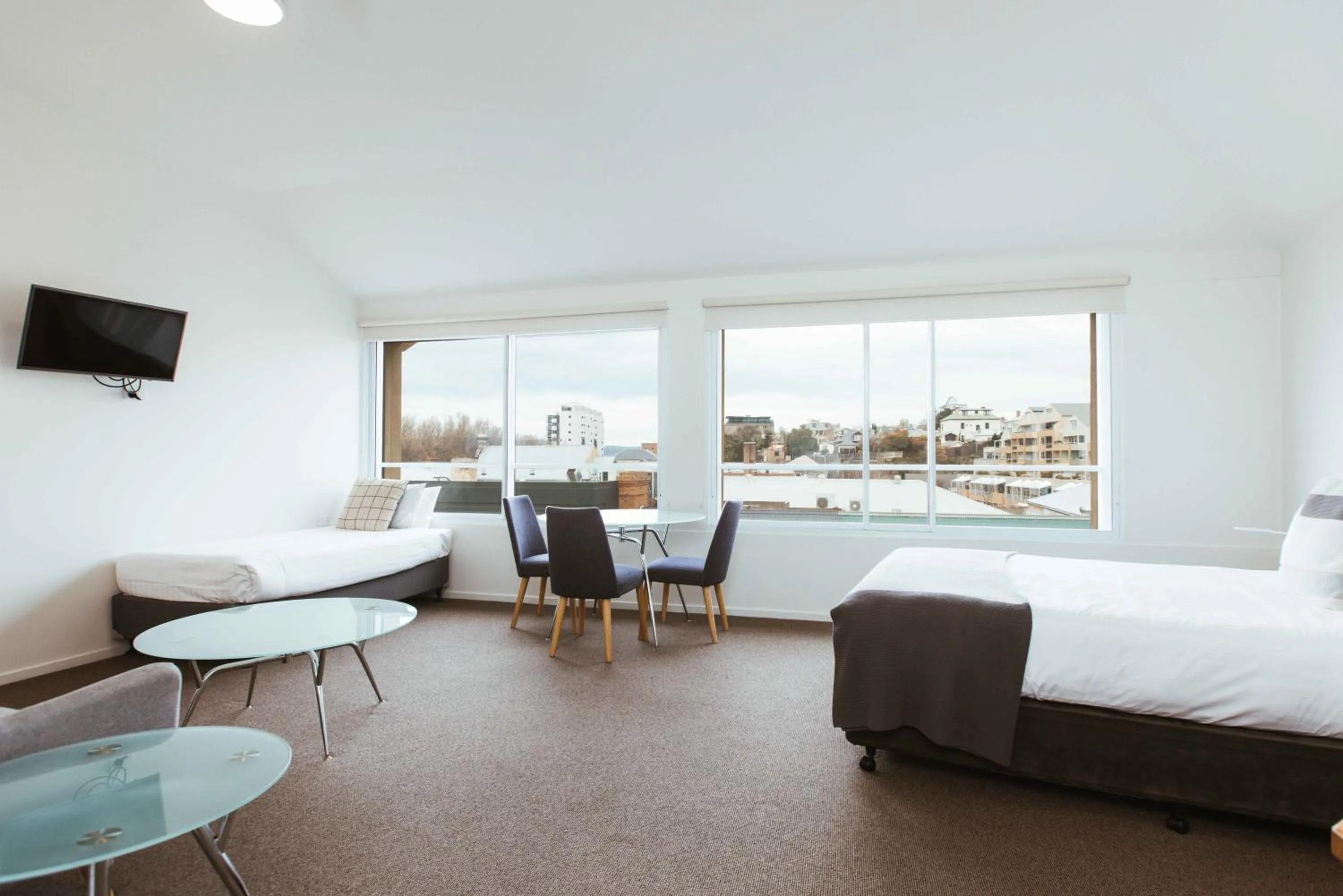Seating area, Bed in Salamanca Galleria Apartments