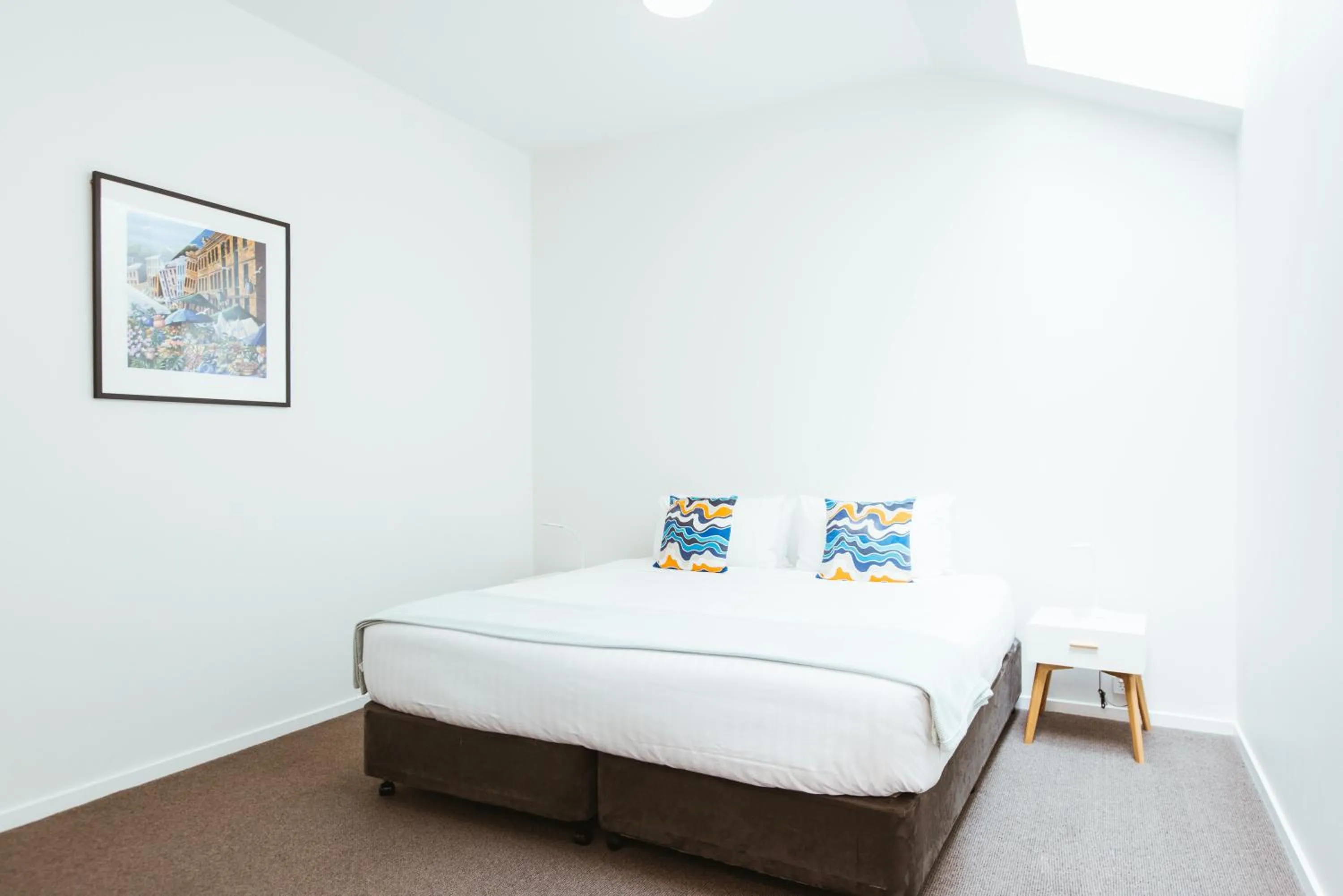 Bed in Salamanca Galleria Apartments