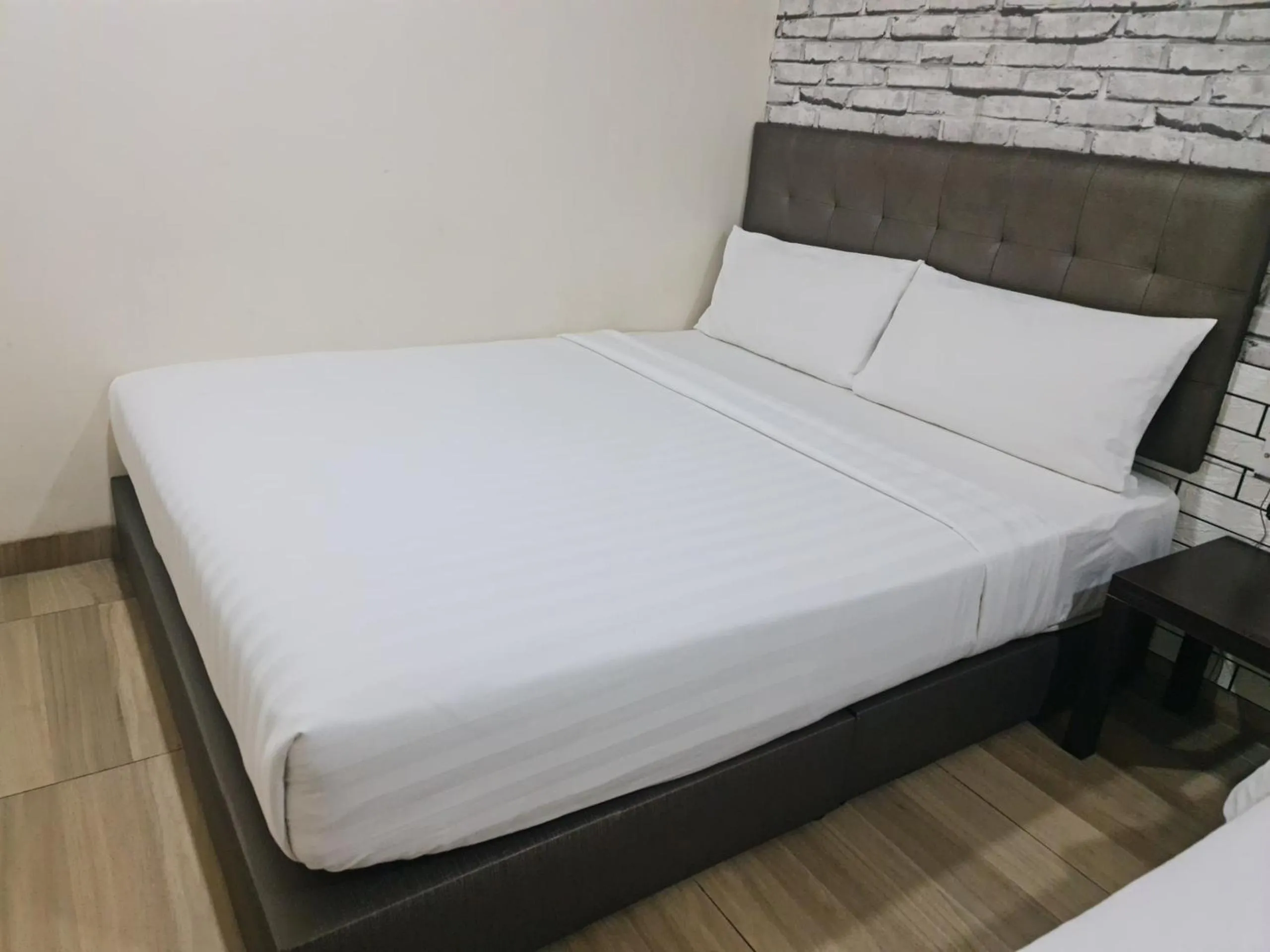 Bed in 888 Boutique Hotel