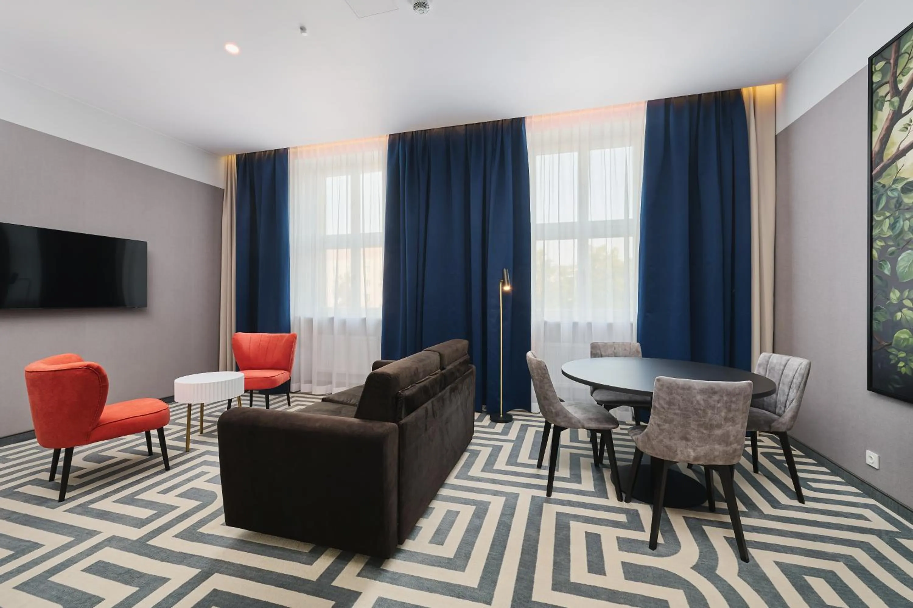 Living room in Aiden by Best Western Lodz