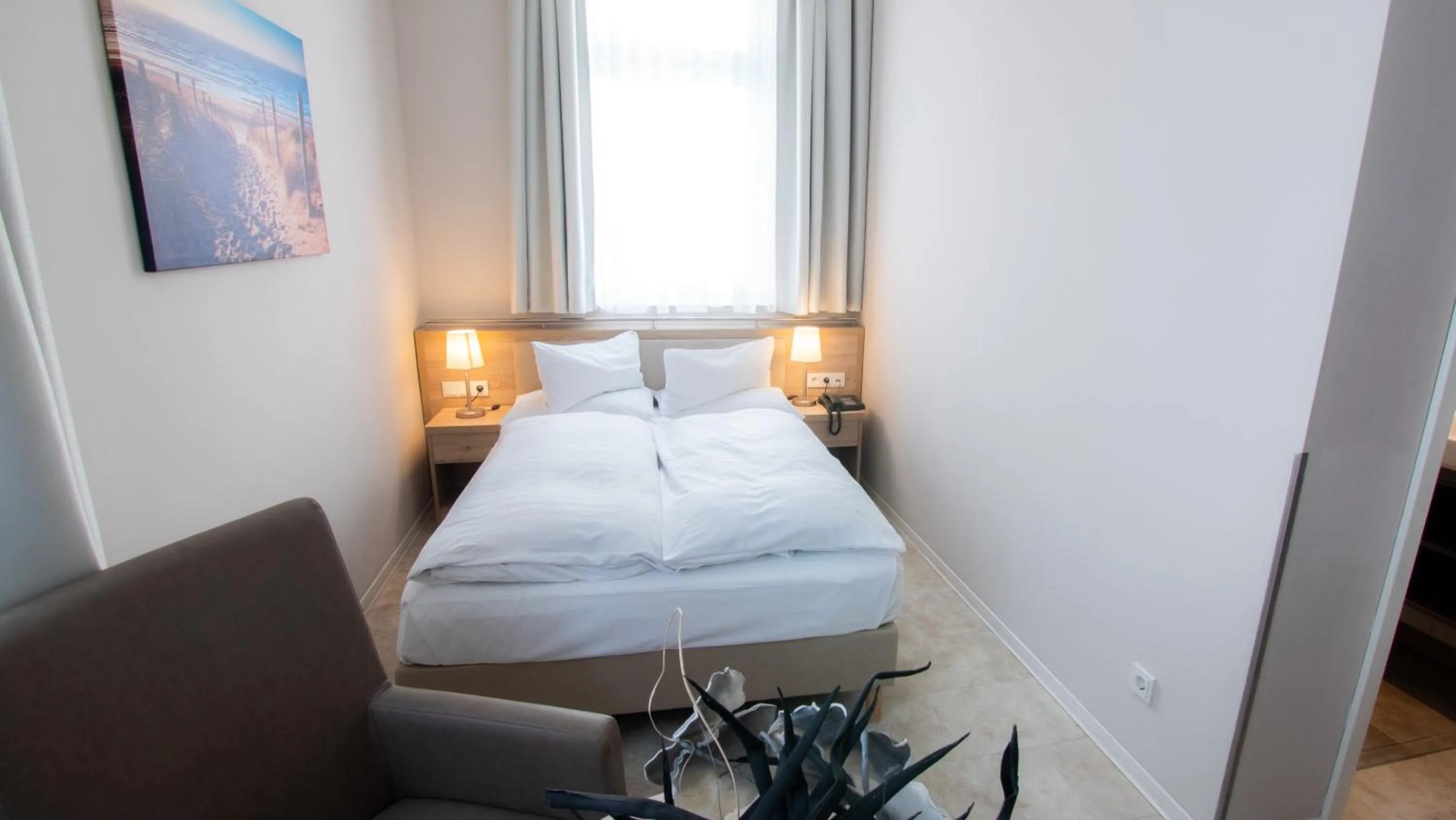 Bedroom, Bed in Ostseehotel Warnemünde