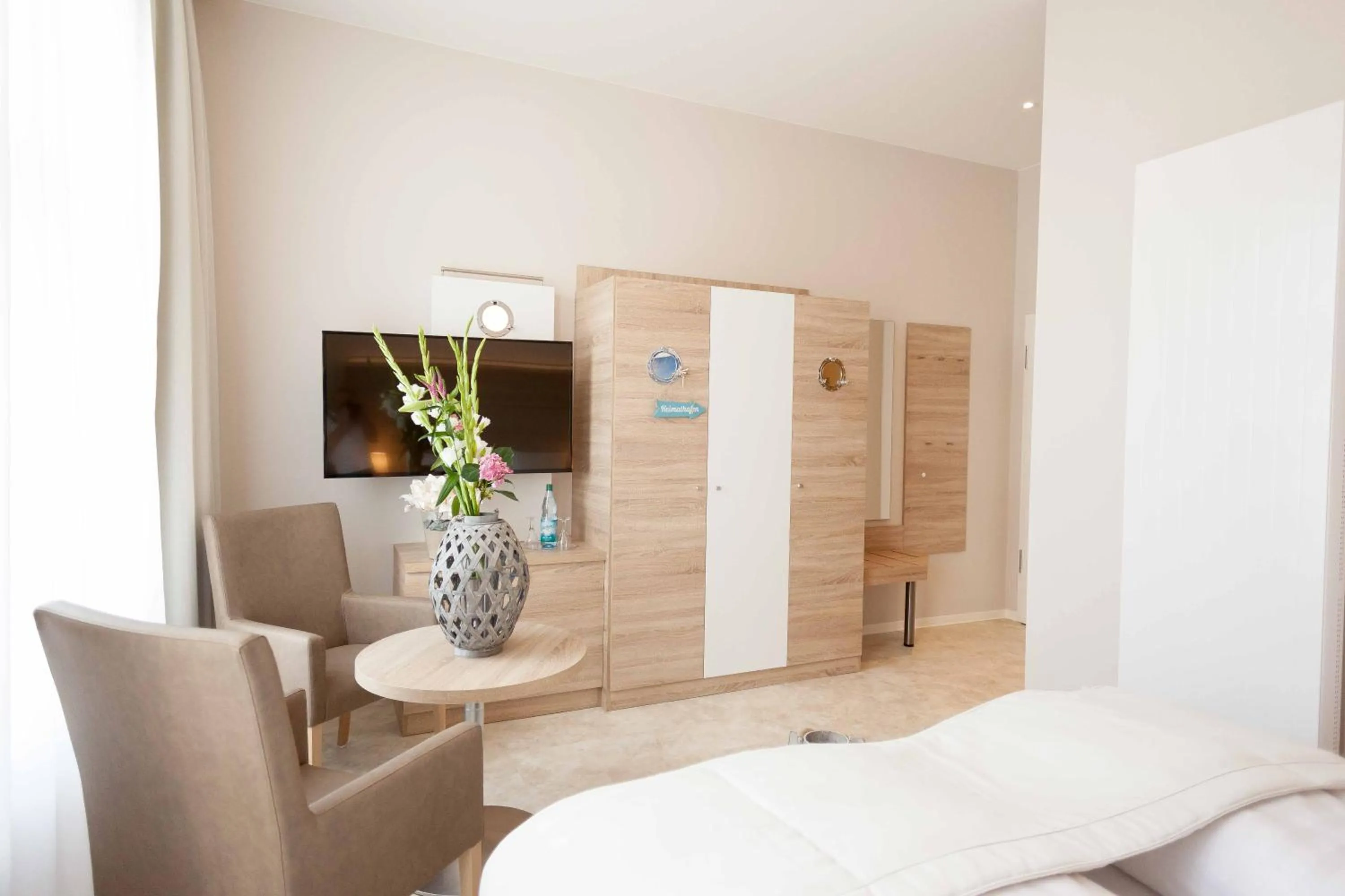 Seating area, Bed in Ostseehotel Warnemünde