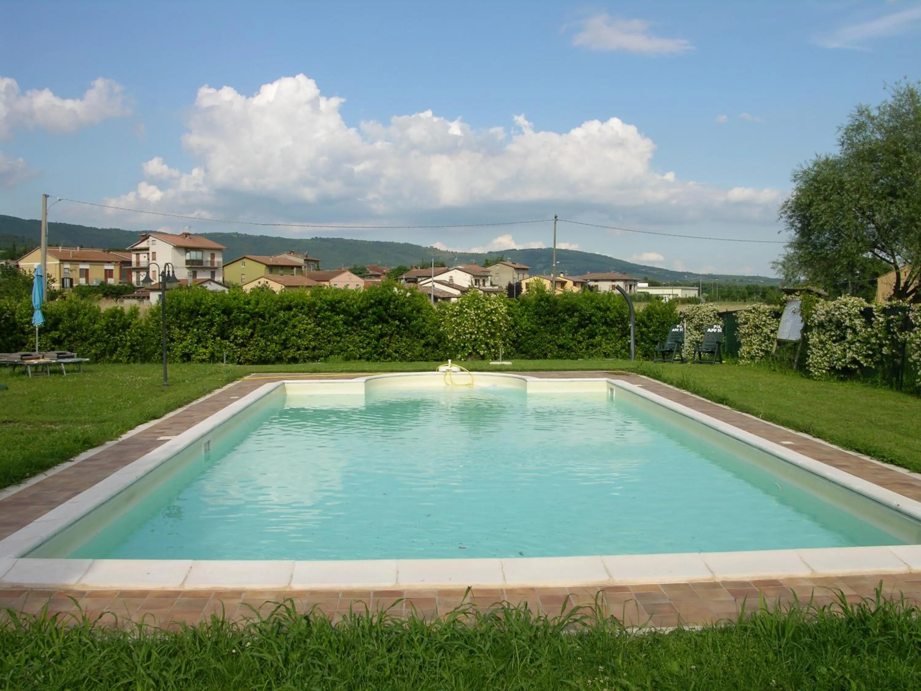 Swimming pool in Appartamento Vacanze Magnolia e Glicine