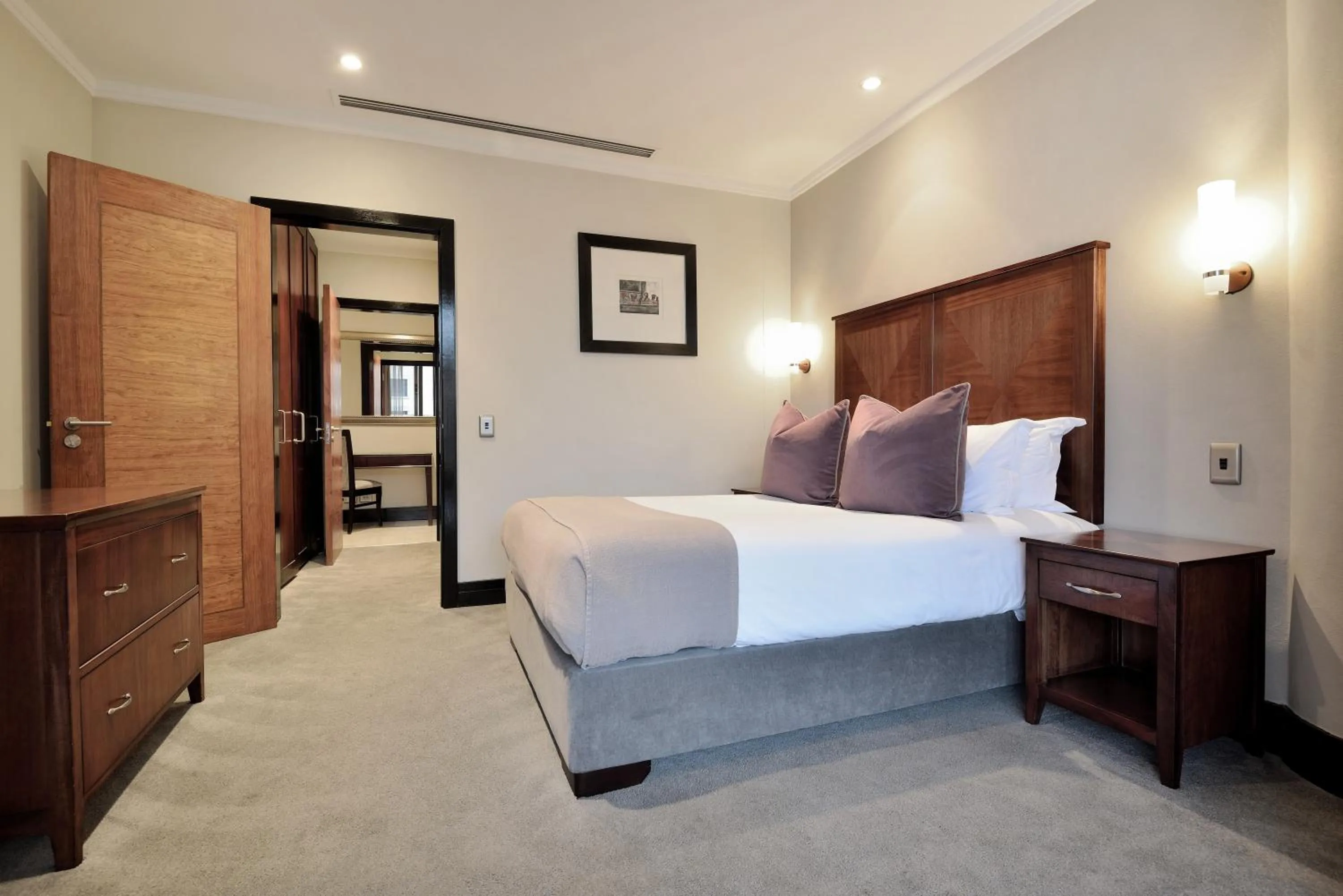 Bed in Raphael Suites