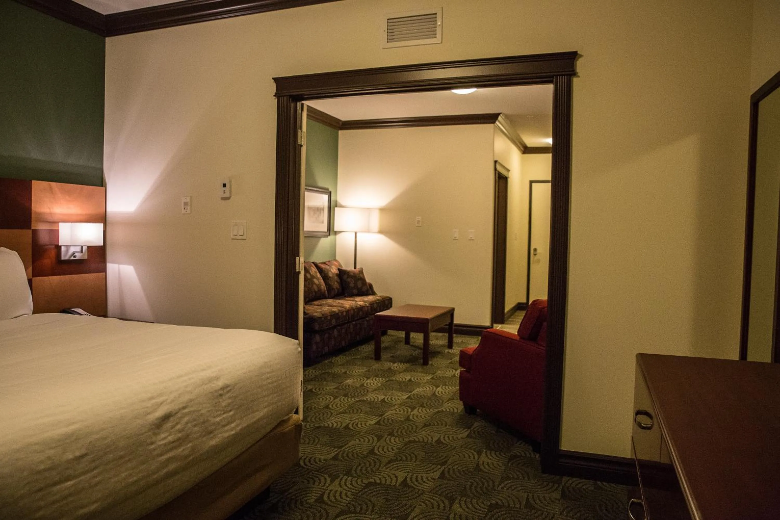 Seating area, Bed in Chateau Nova Peace River