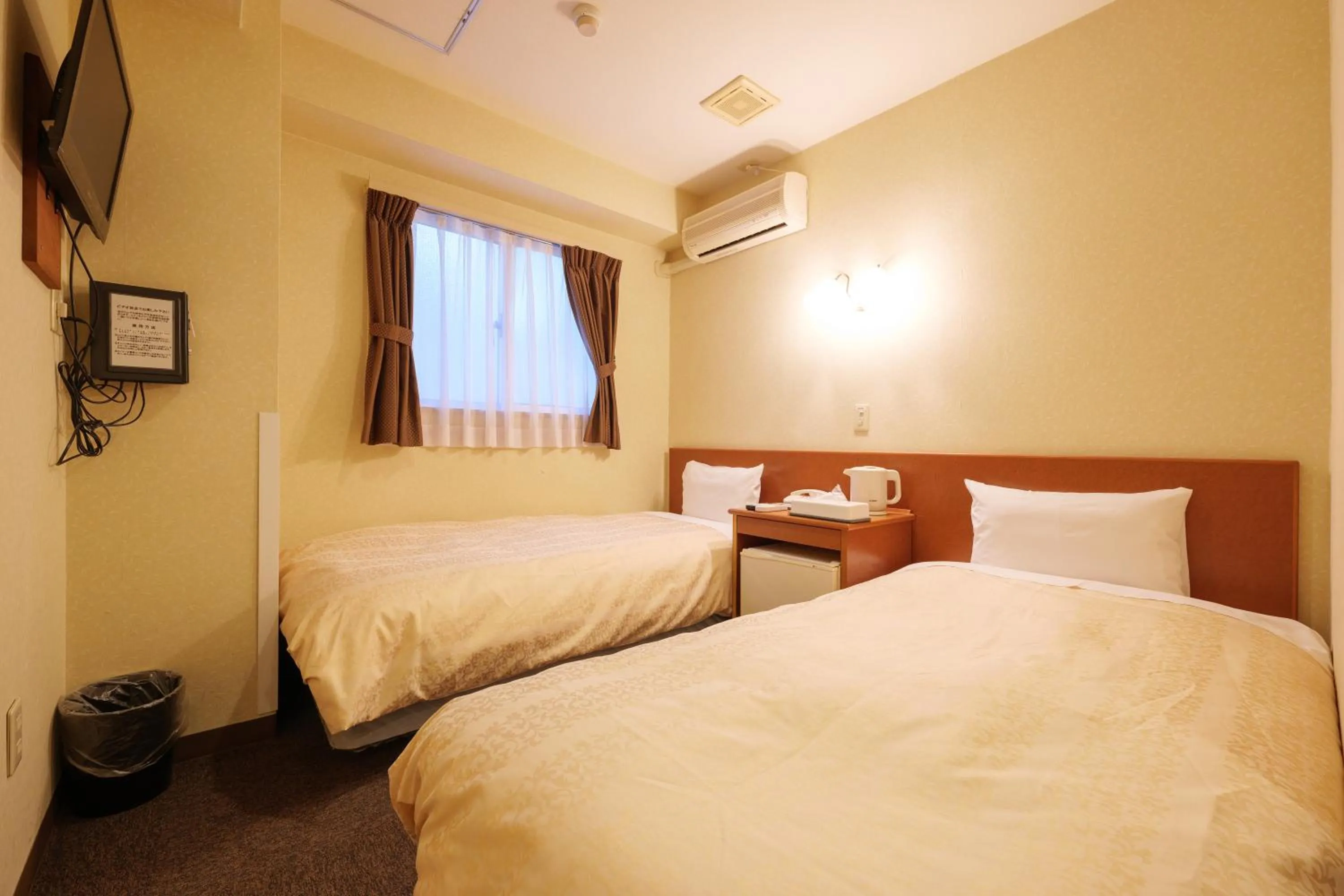 Bed in Hotel Suntargas Ueno