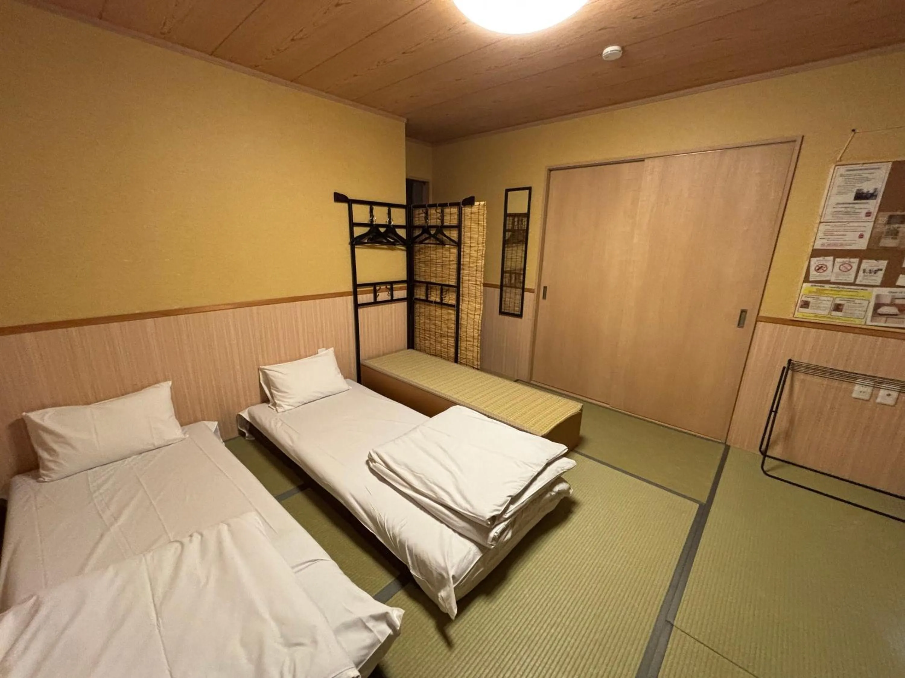 Bed in GuestHouse Guu