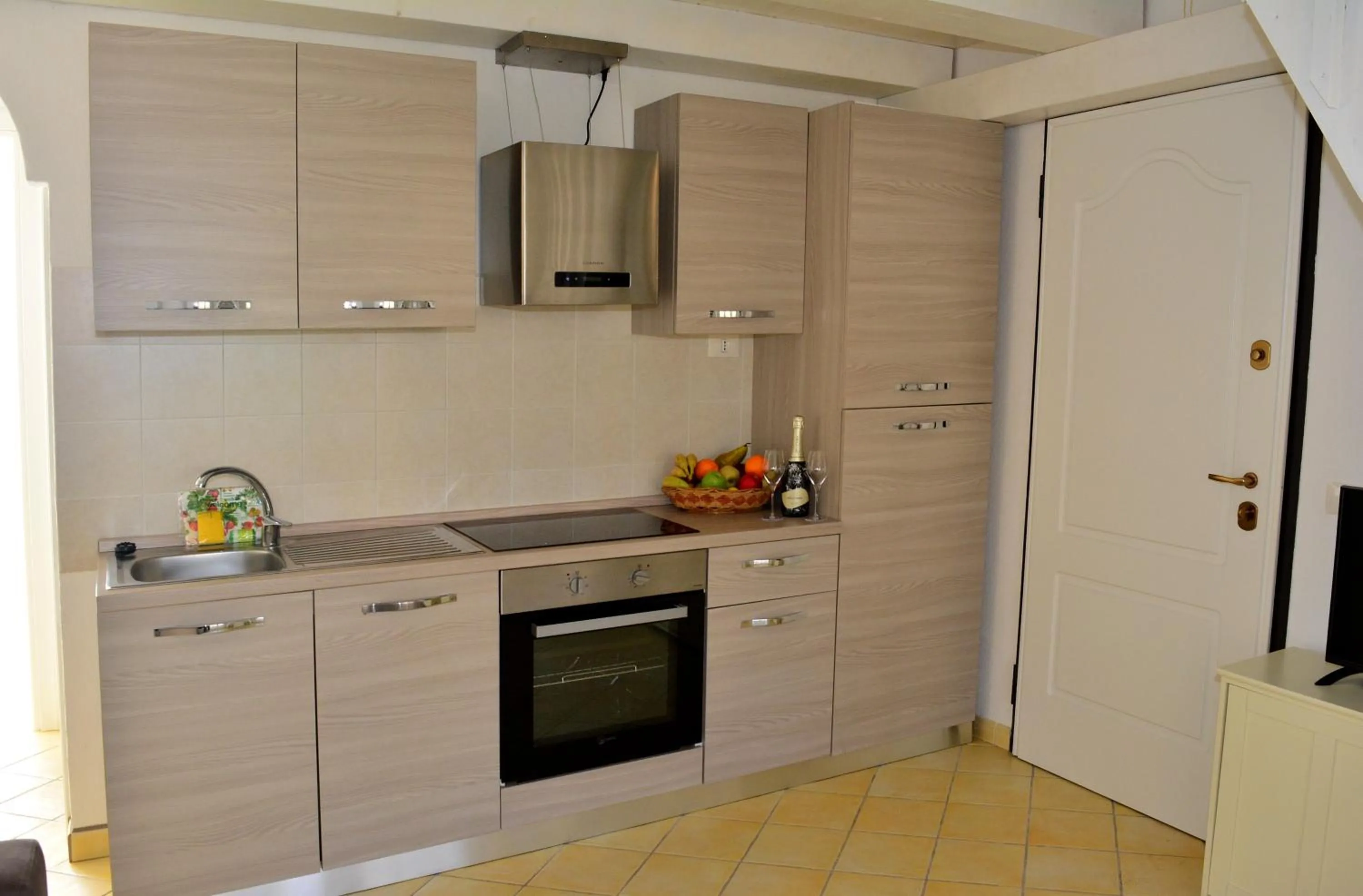 Kitchen or kitchenette in Appartamenti Residence Zodiaco