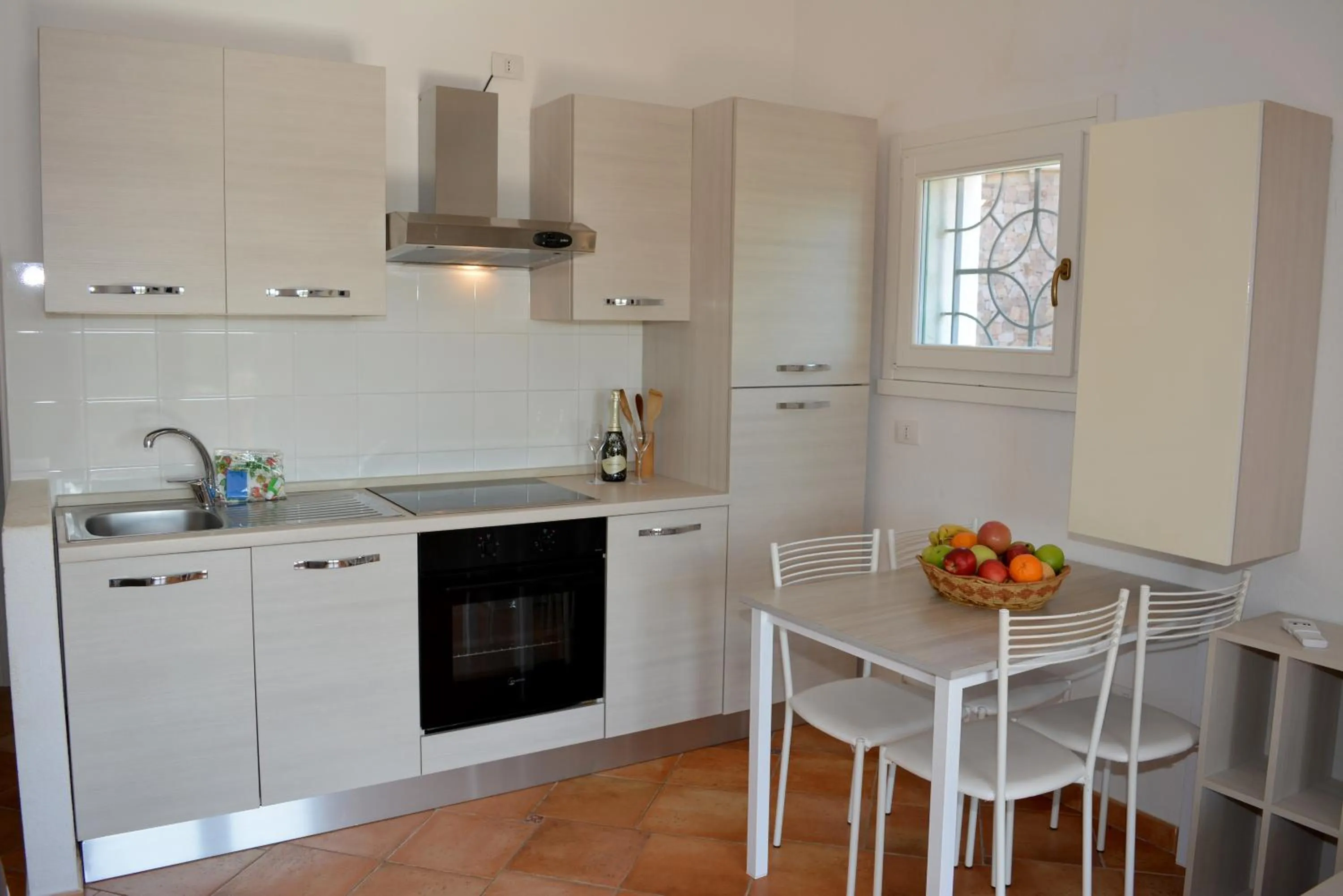 Kitchen or kitchenette in Appartamenti Residence Zodiaco