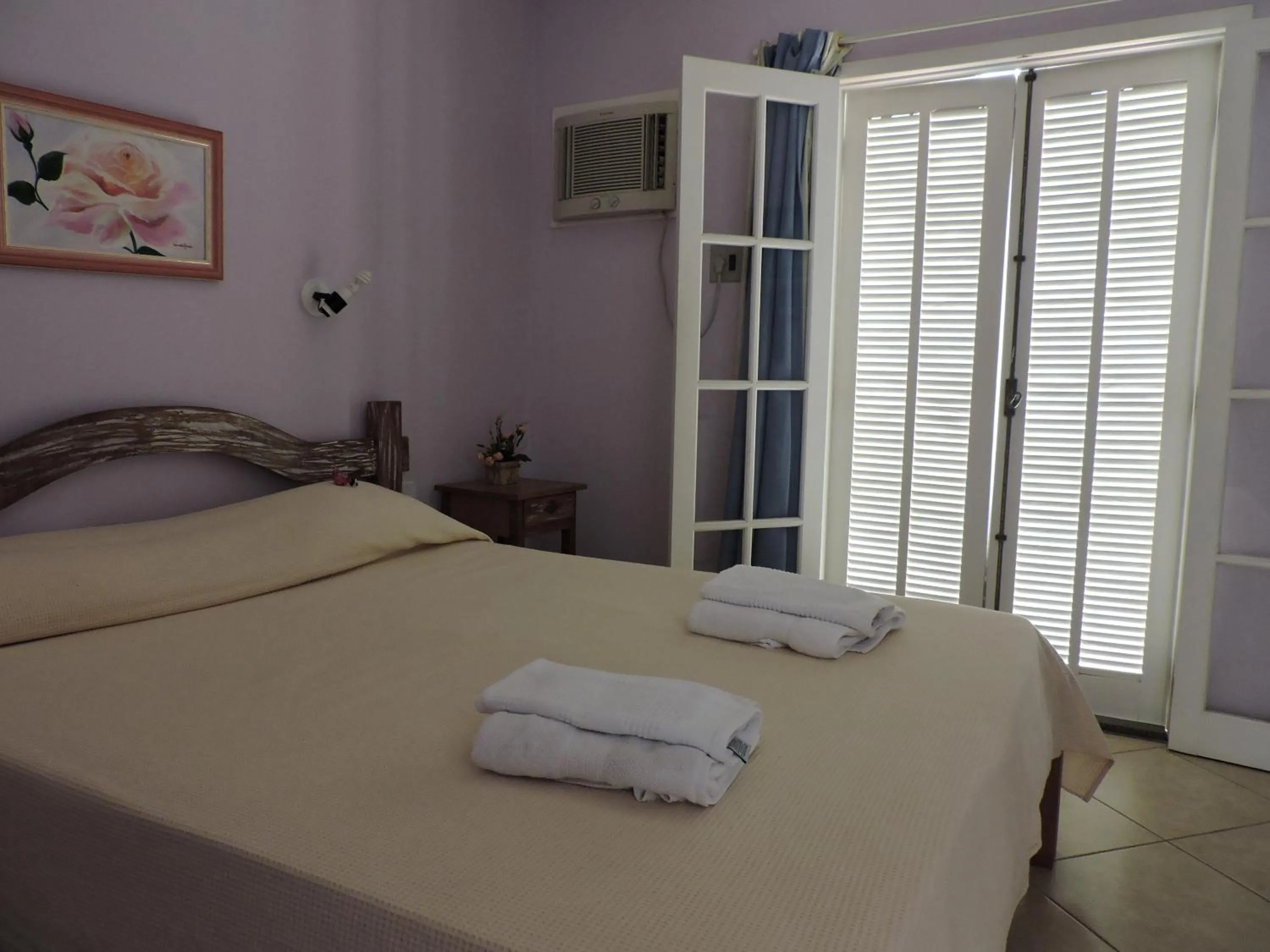 Photo of the whole room, Bed in Pousada D'amoras