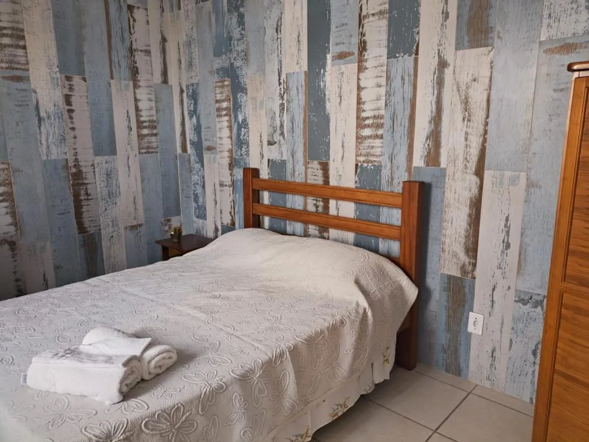 Bed in Pousada D'amoras