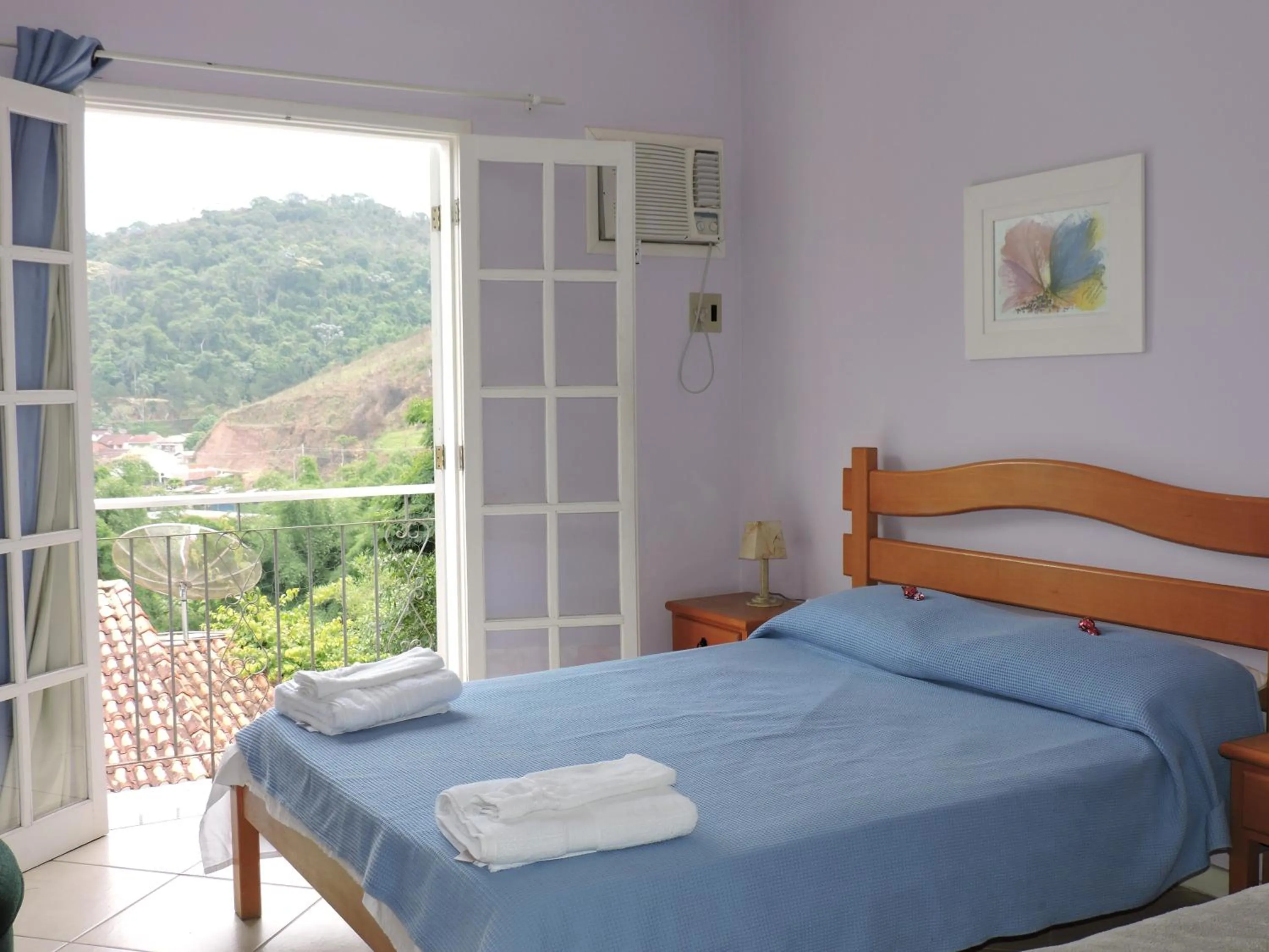 City view, Bed in Pousada D'amoras