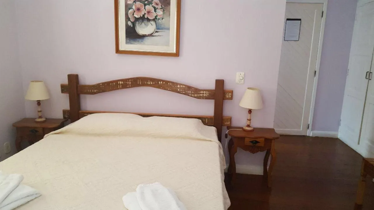 Bed in Pousada D'amoras