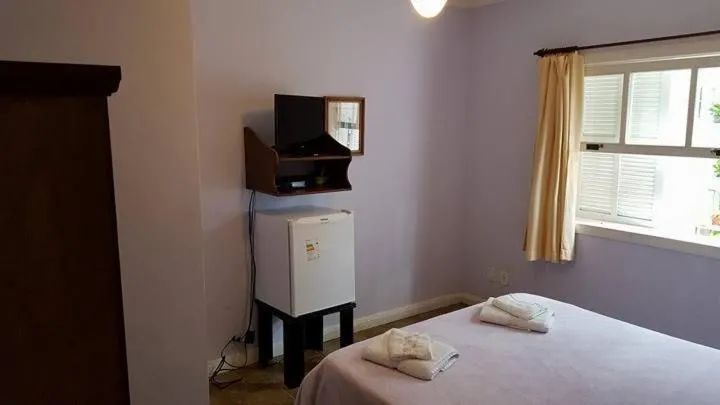 Photo of the whole room, Bed in Pousada D'amoras
