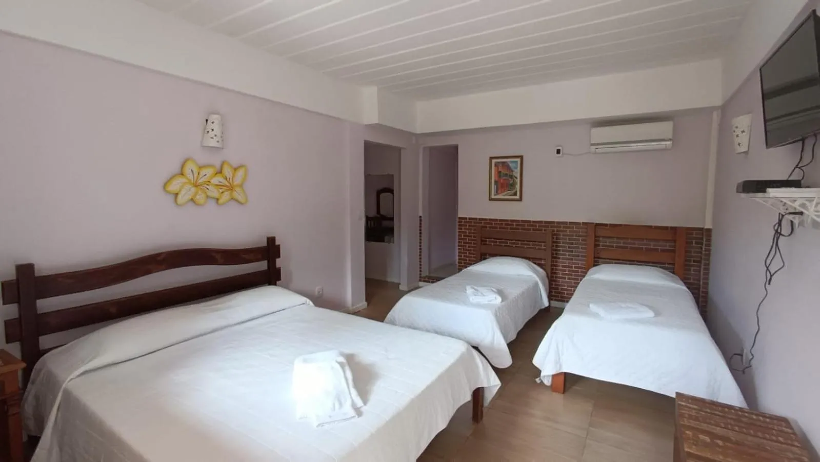 Bed in Pousada D'amoras