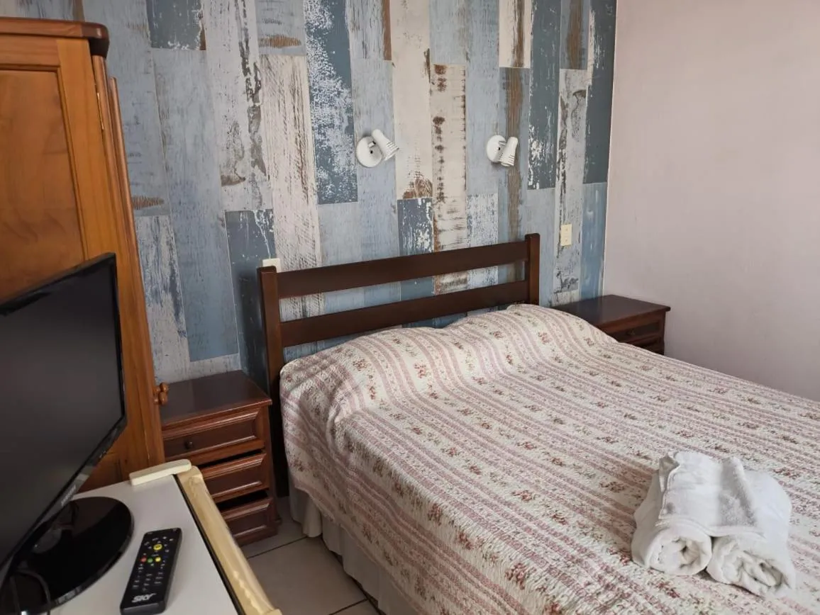 Bed in Pousada D'amoras