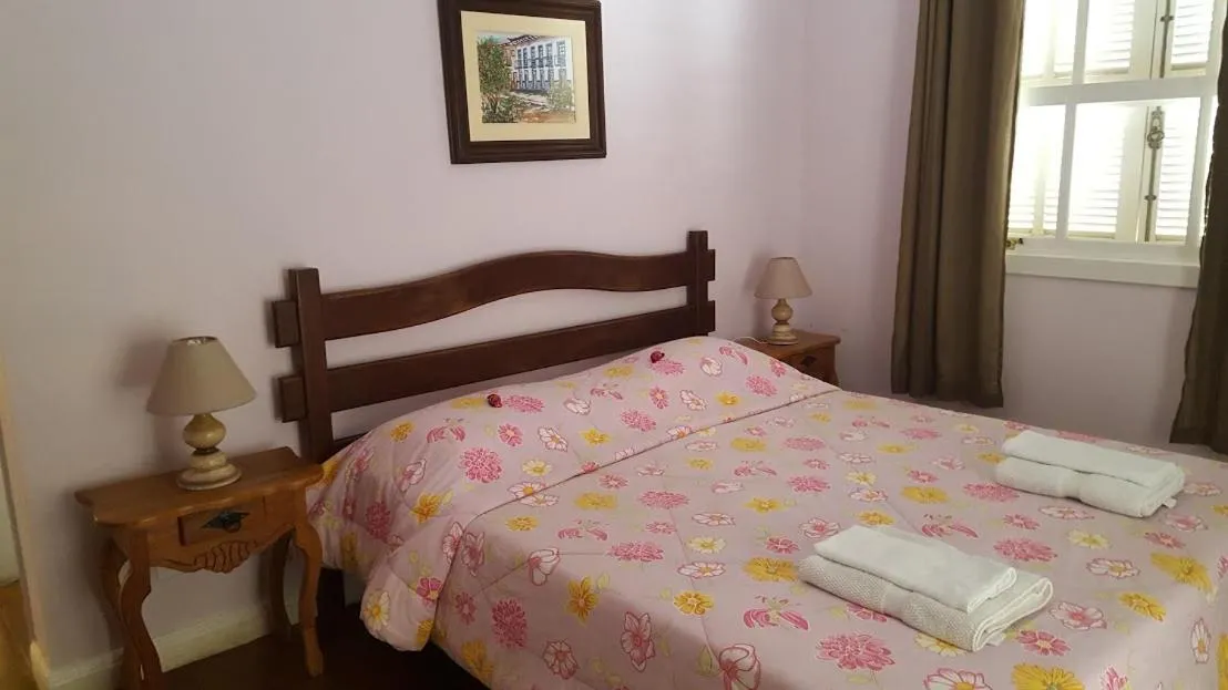 Photo of the whole room, Bed in Pousada D'amoras