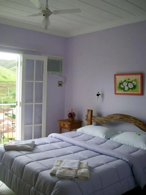 Photo of the whole room, Bed in Pousada D'amoras