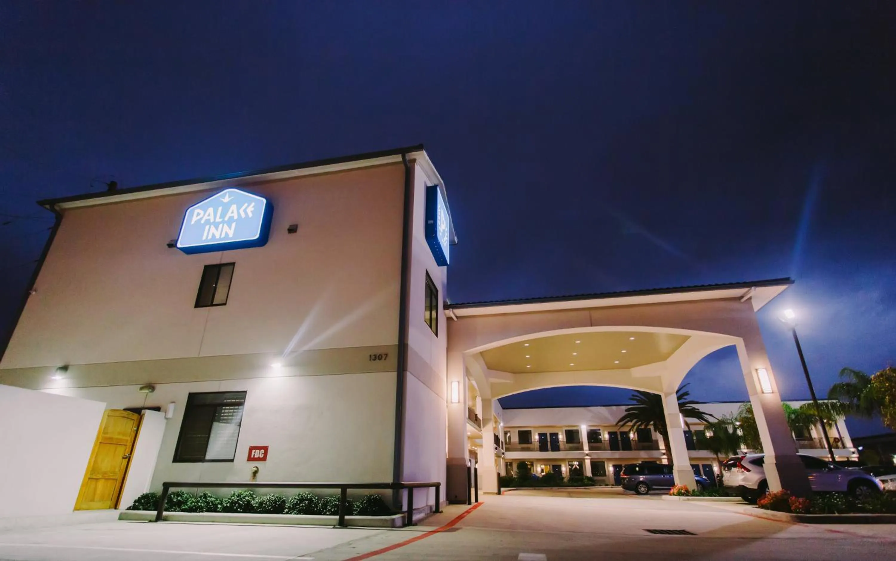 Property logo or sign in Palace Inn Blue City Centre