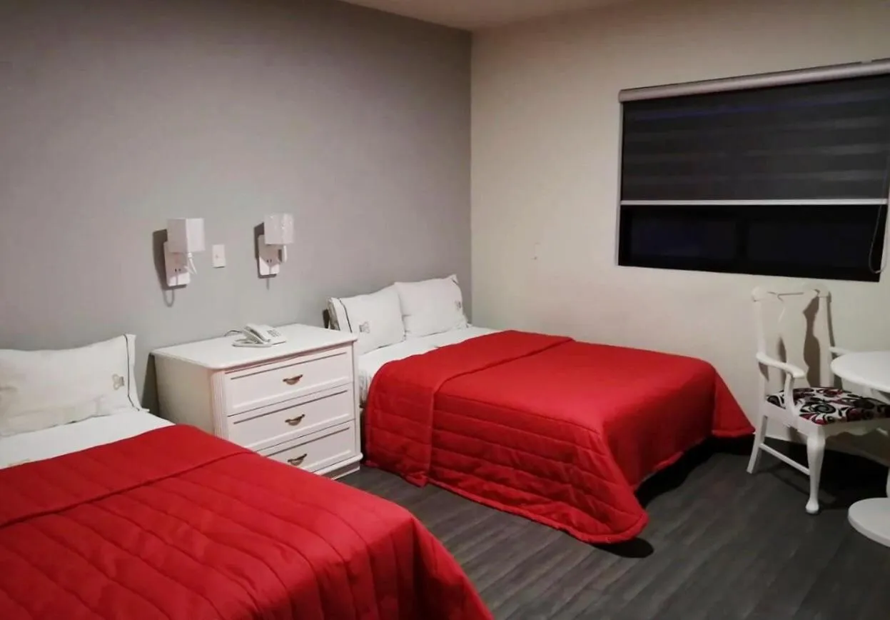 Bed in Hotel Grand Reyes