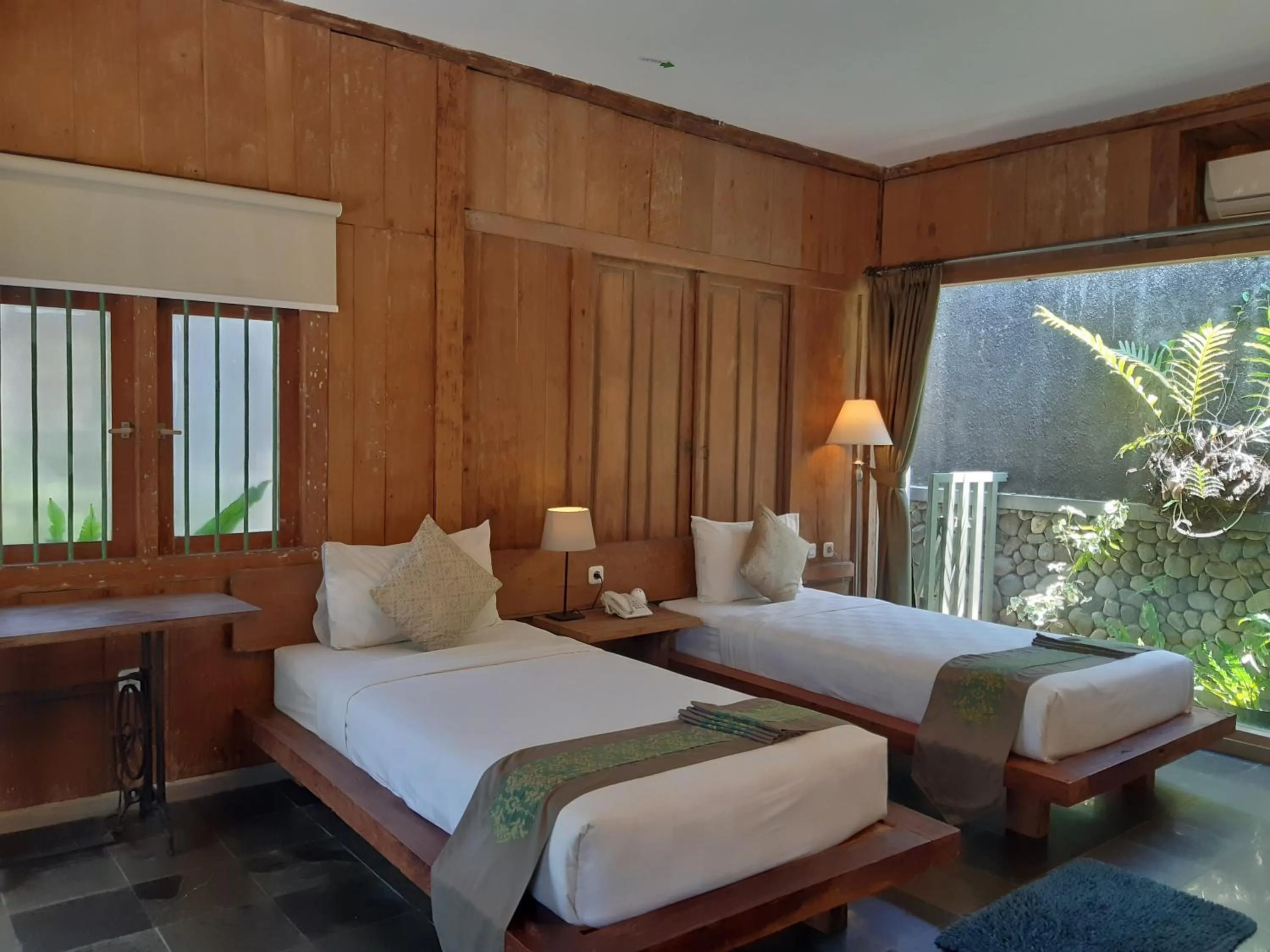 Bed in WARISAN Heritage Boutique Hotel