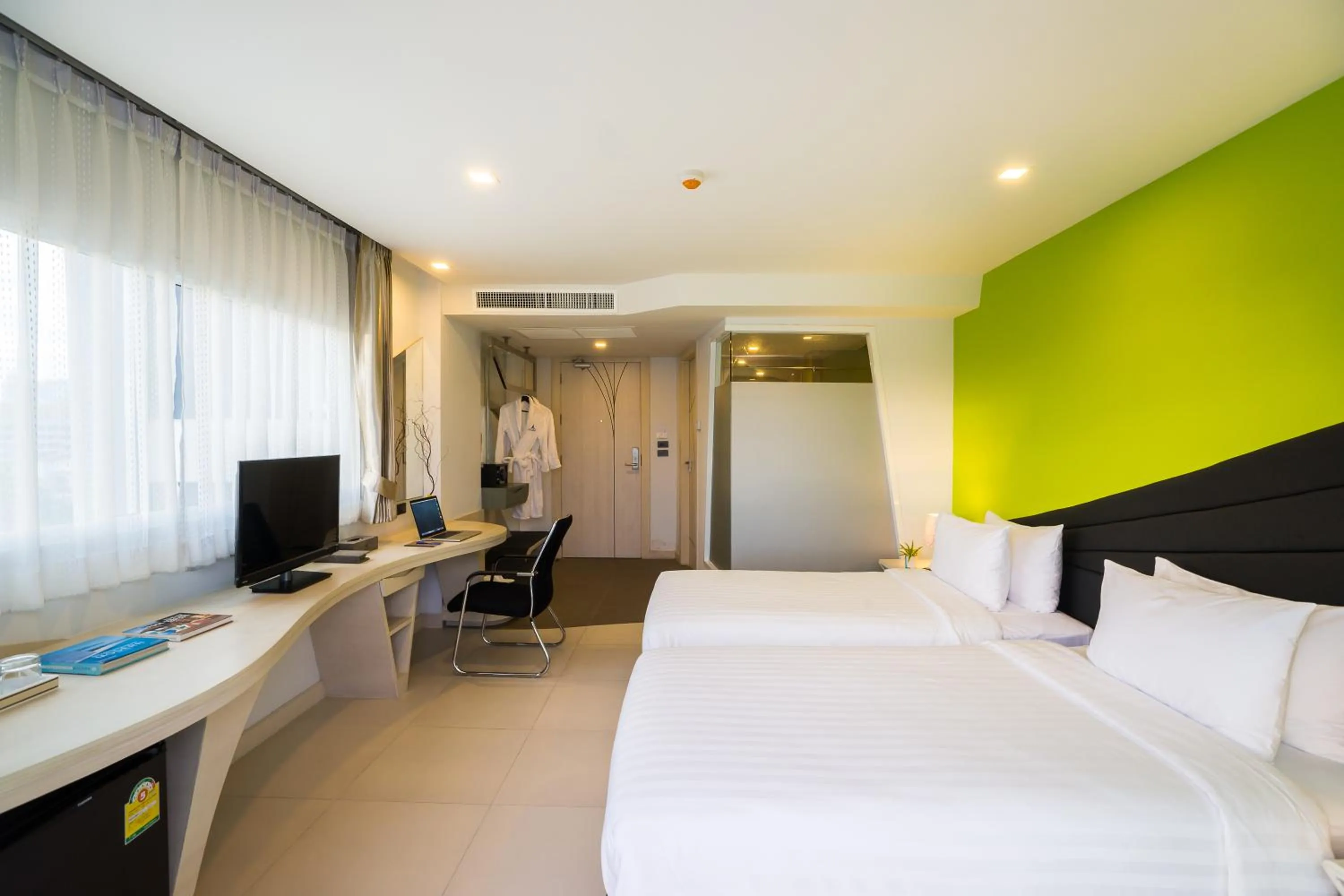 Bed in Blue Boat Hotel JC