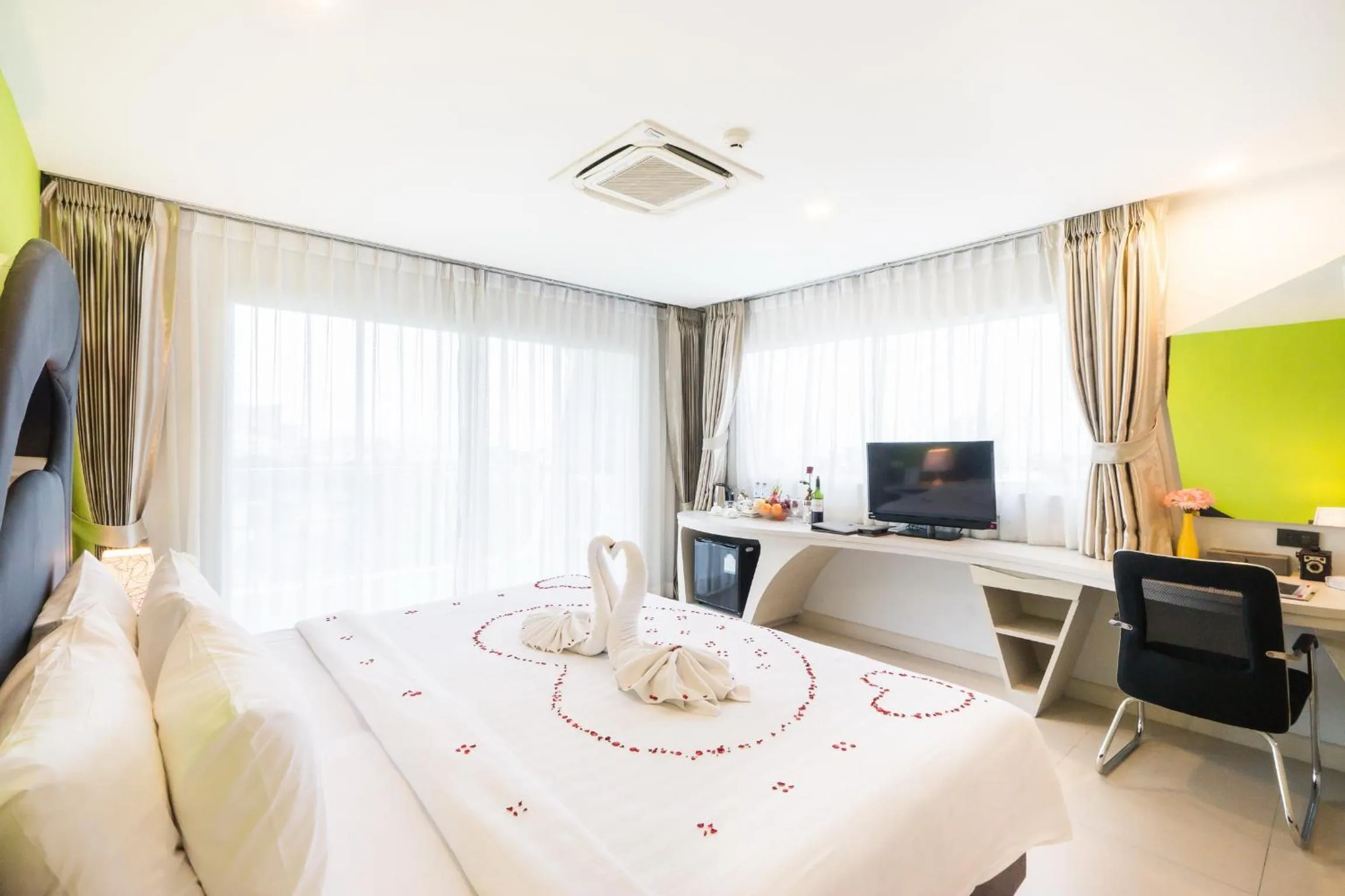 Bed in Blue Boat Hotel JC