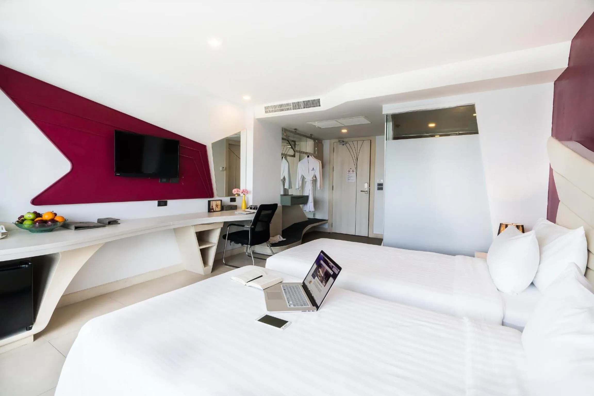 Bed in Blue Boat Hotel JC