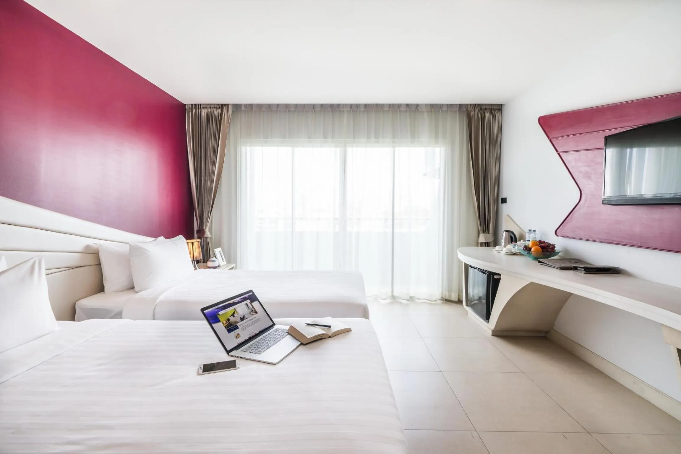 Bed in Blue Boat Hotel JC