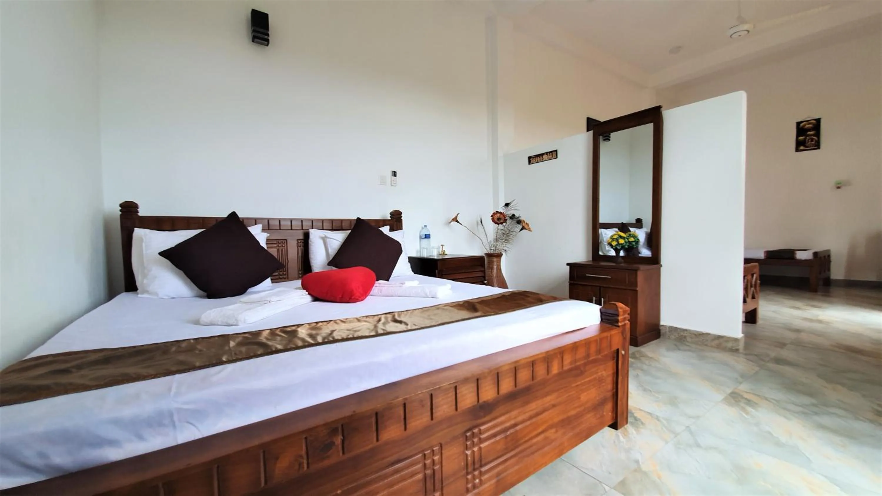 Bed in Dhammika Magic Palace