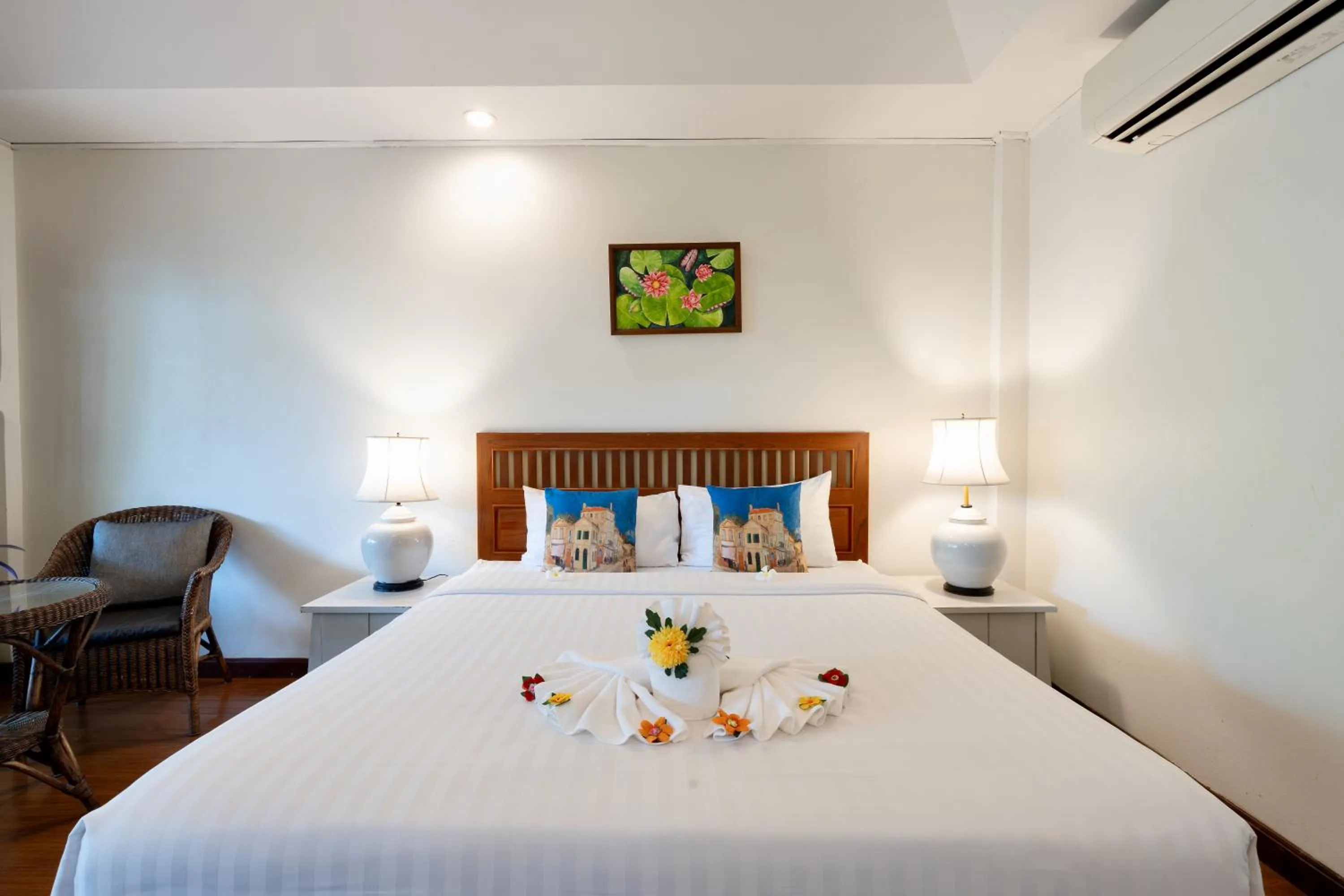 Bed in Natural Park Resort Pattaya