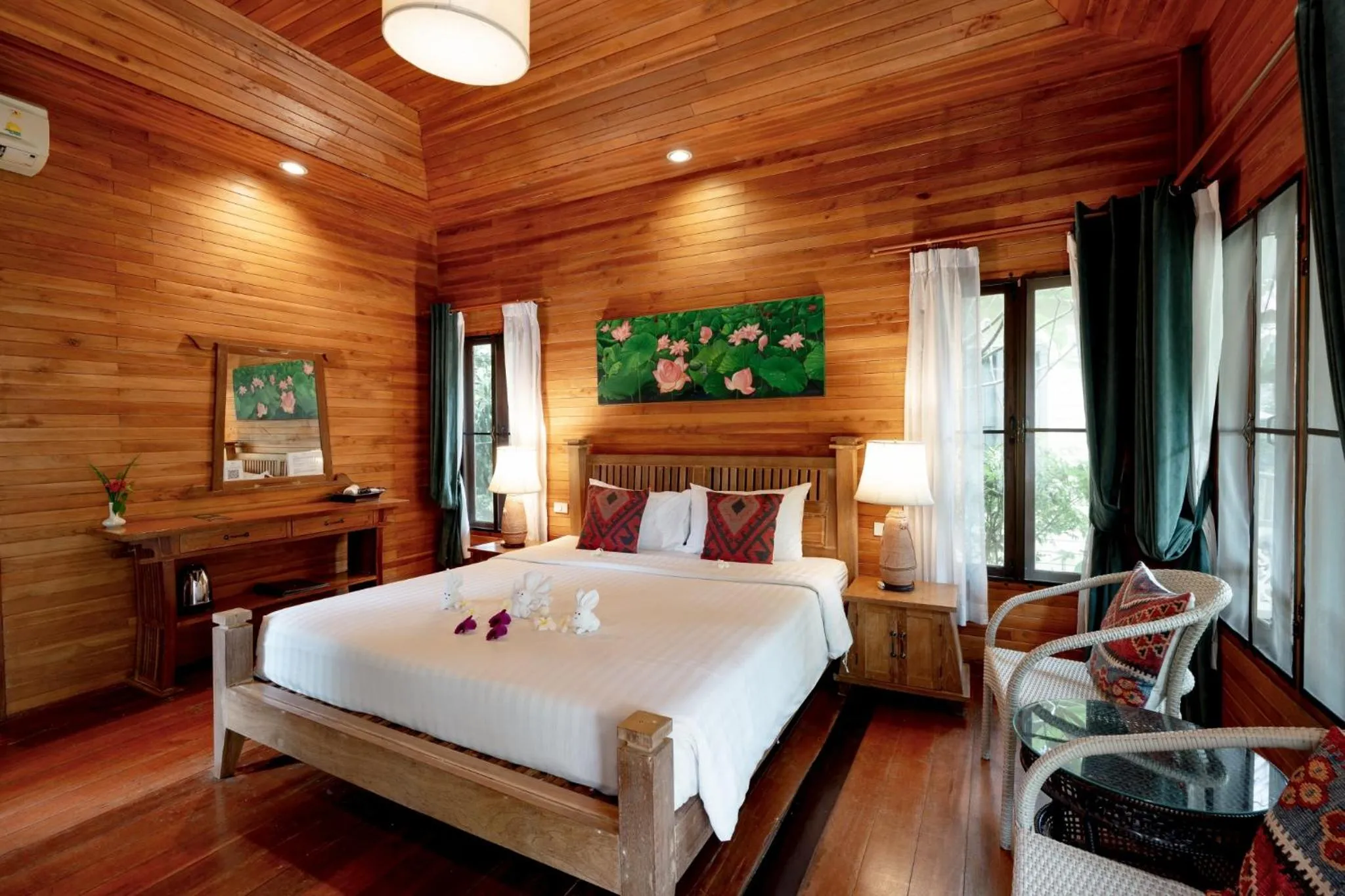 Bed in Natural Park Resort Pattaya