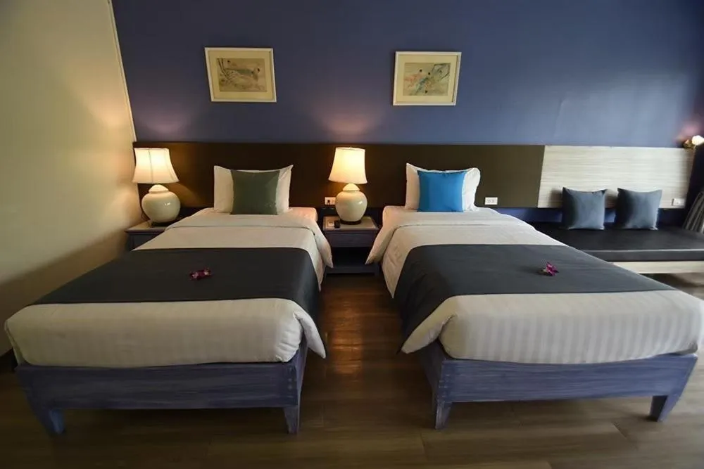 Bed in Natural Park Resort Pattaya