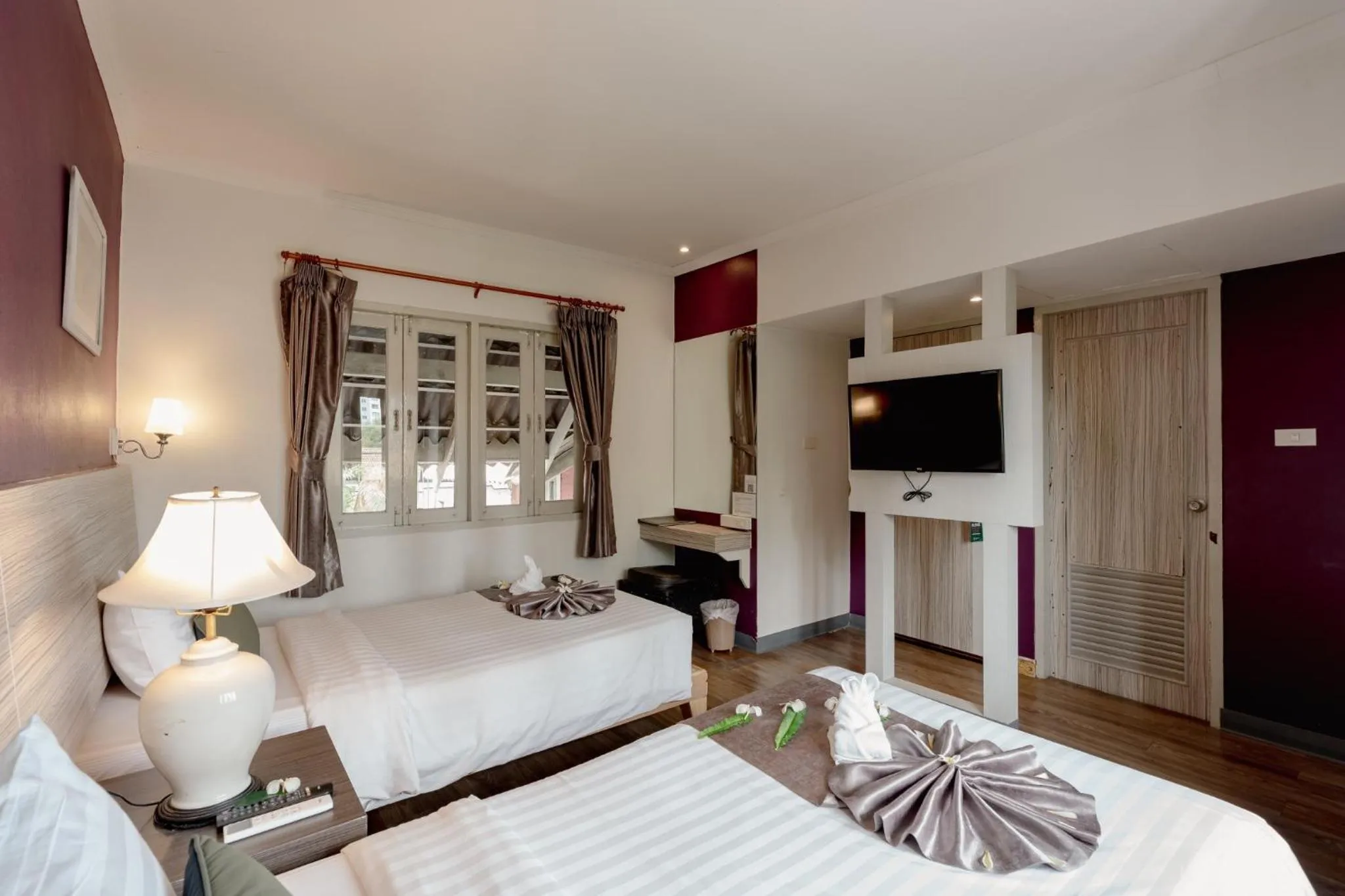 Bed in Natural Park Resort Pattaya