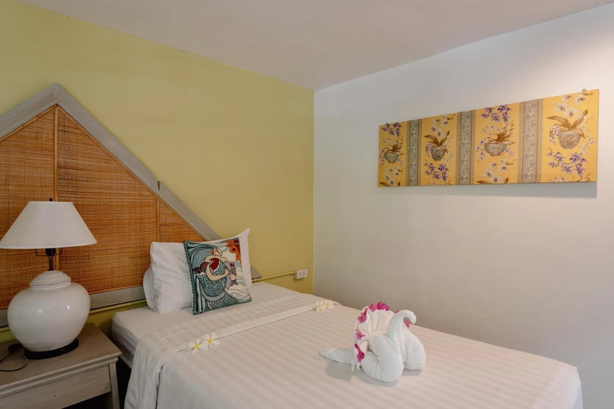 Bed in Natural Park Resort Pattaya