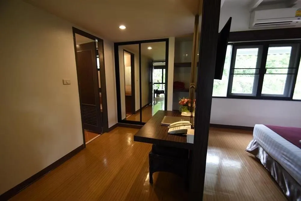 Bed in Natural Park Resort Pattaya