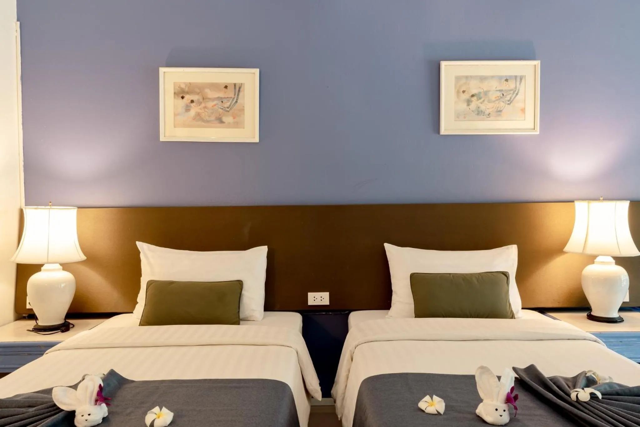 Bed in Natural Park Resort Pattaya