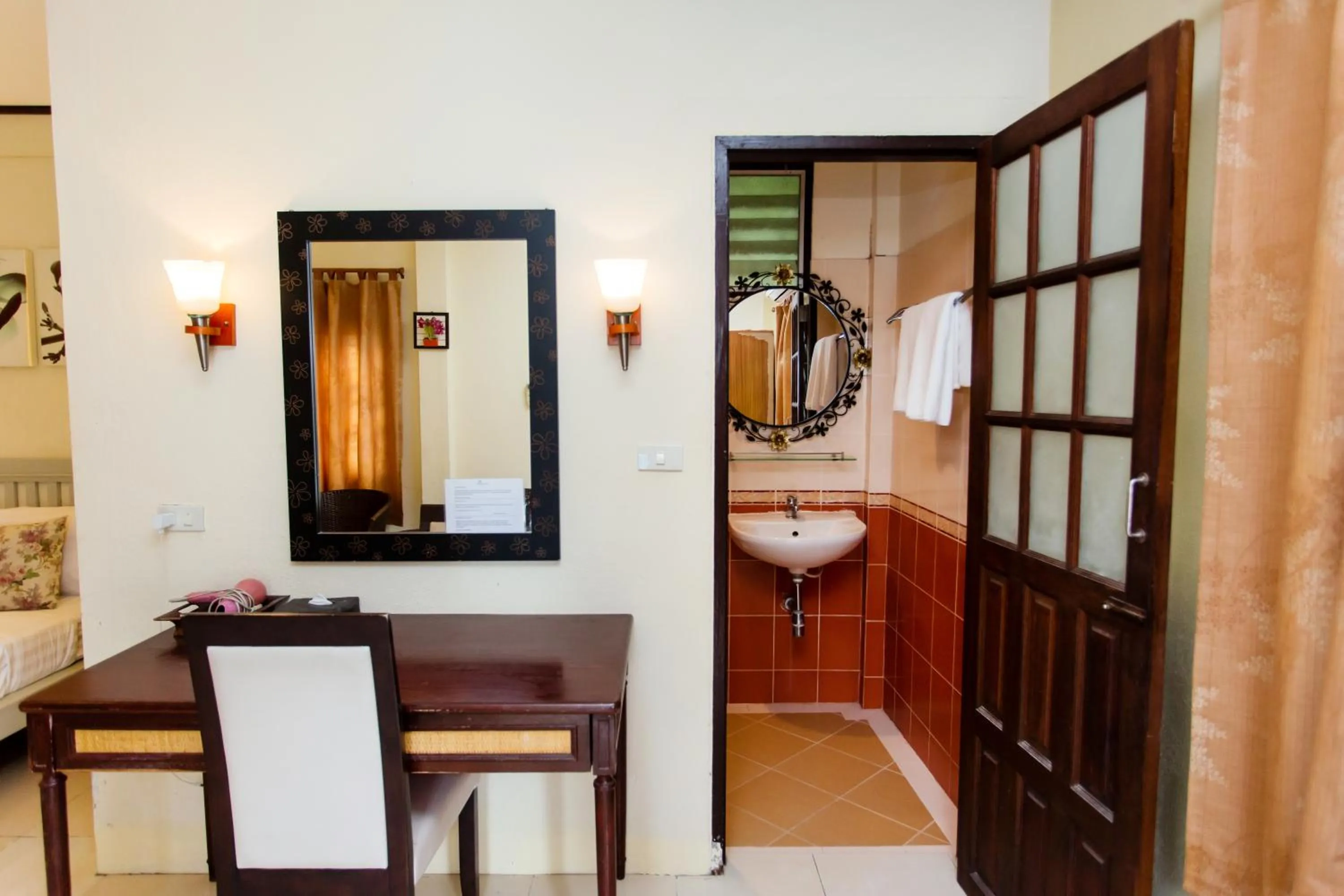 Bed in Natural Park Resort Pattaya