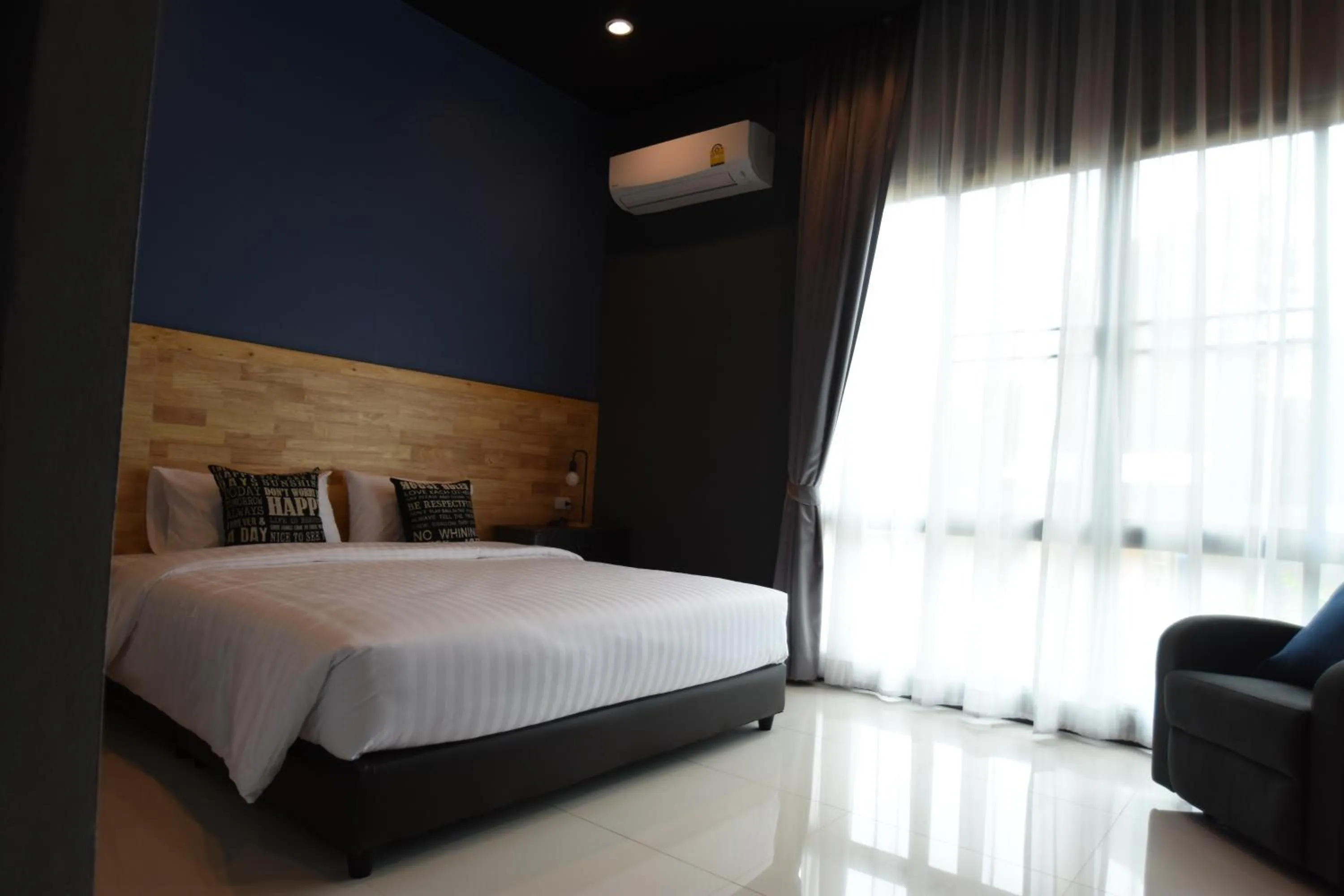 Bed in Natural Park Resort Pattaya