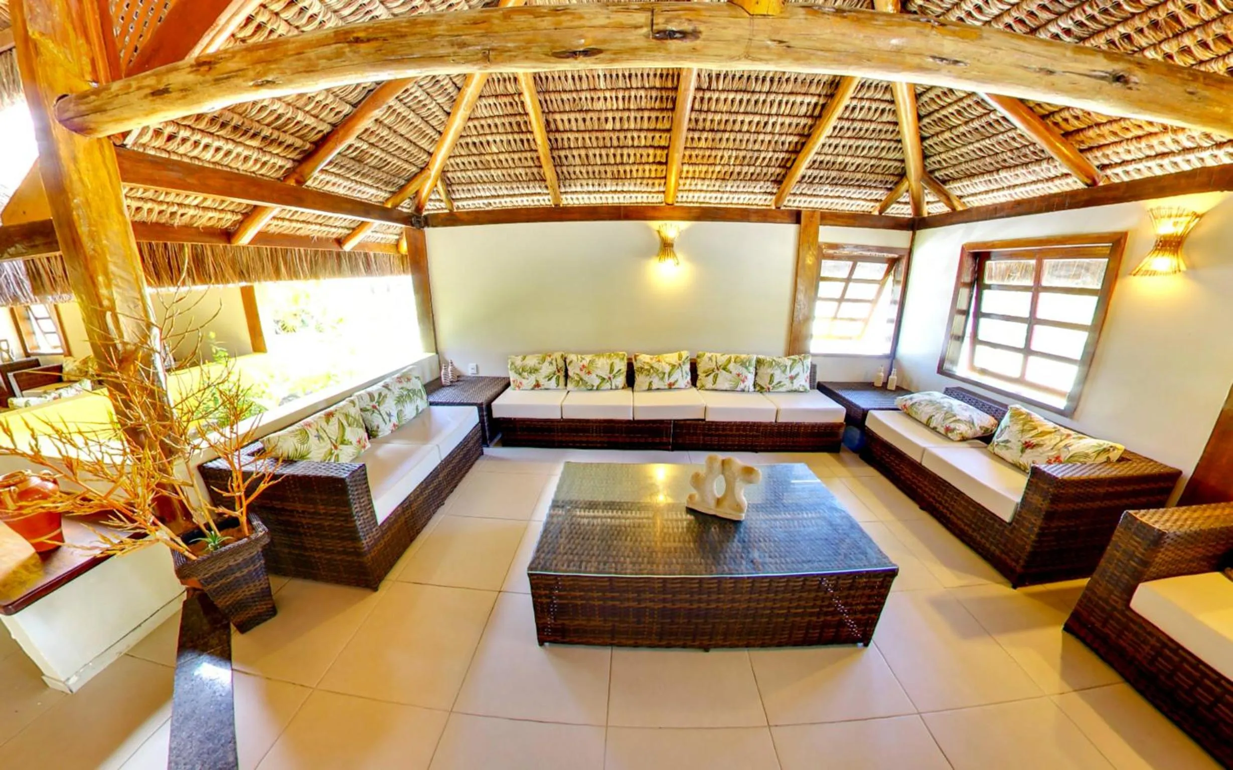 Communal lounge/ TV room, Bed in Makaira Beach Resort