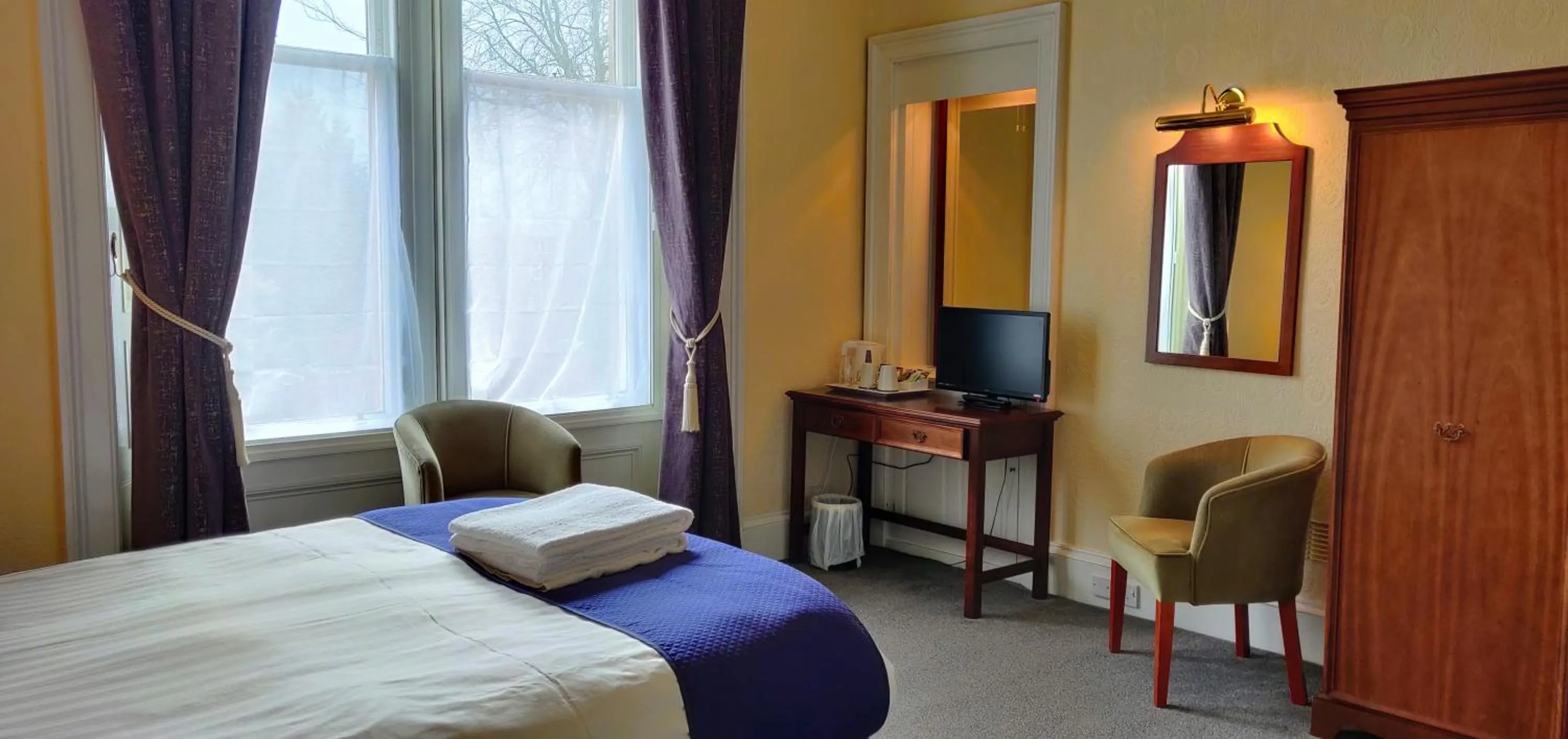 Bedroom, TV/Entertainment Center in Hartfell Guest House